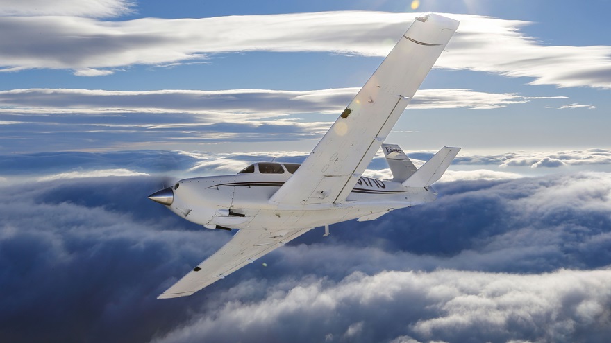 In many airplanes with a high-speed propeller, the lever or knob to the right of the throttle is blue and controls the engine rpm. In this Mooney M20C, it's black, just like the throttle to the left that controls manifold pressure.
