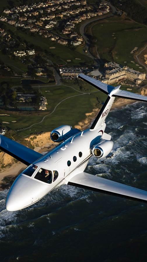 Aerial photography of AOPA Editor at Large, Tom Horne, flying Thierry Pouille's Cessna Mustang off the coast of California between Monterey and San Francisco.San Francisco BaySan Francisco CA USA