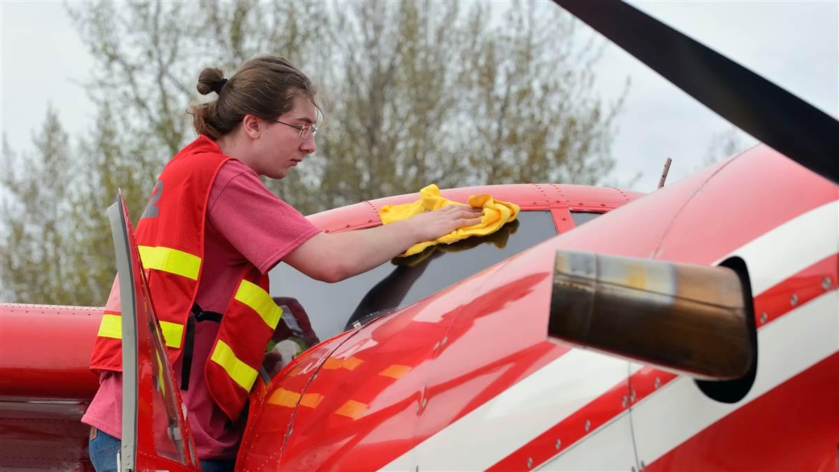 Several Talkeetna Build-A-Plane graduates now work for K2 Aviation. Brandon Smothers works the ramp during his college break; he wants to become an airline pilot.