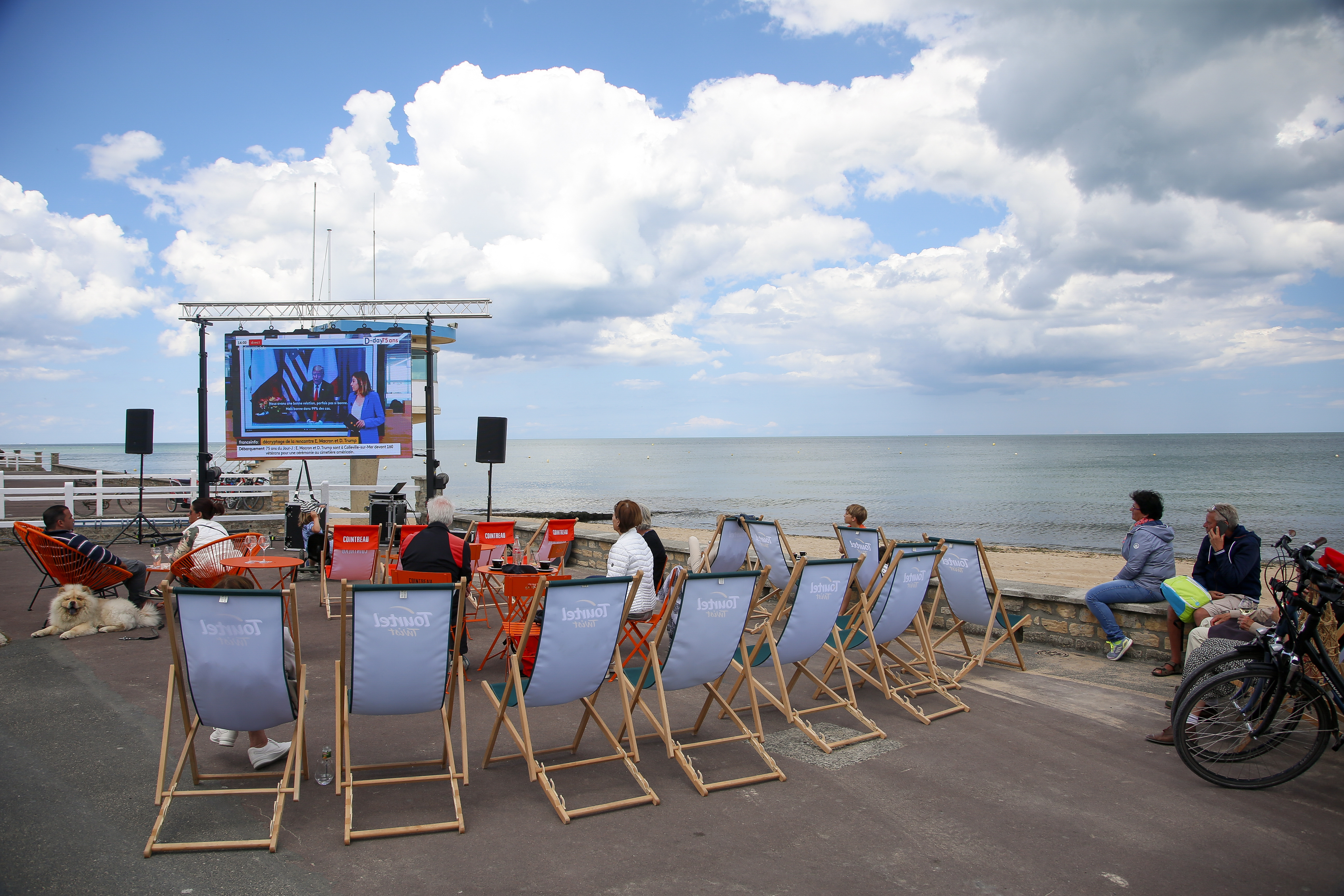 Bars and restaurants along the beach set up viewing stations for the anniversary activities elsewhere in Normandy.
