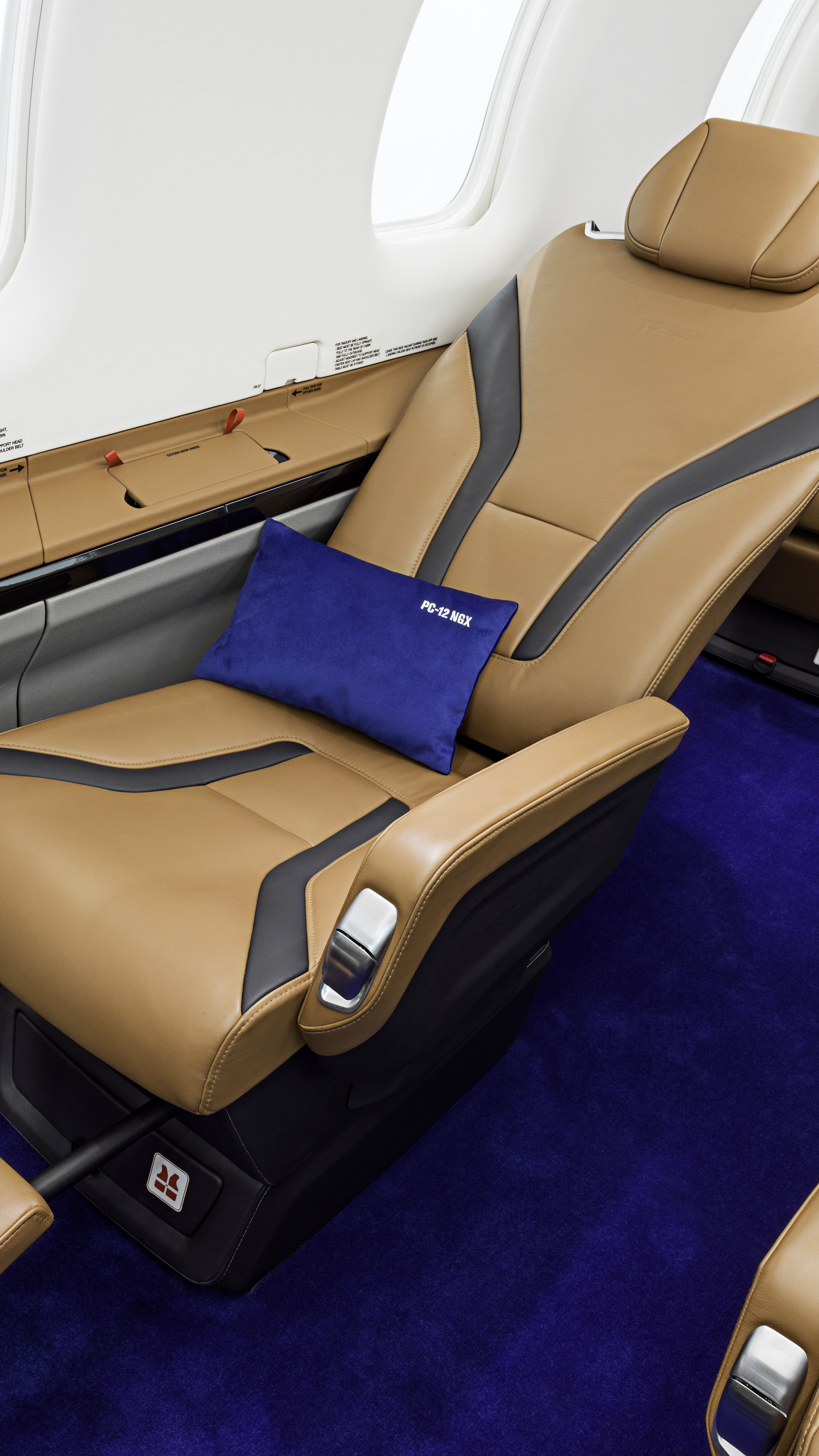 ...like the redesigned leather seats with optional footrests, new sidewall ledges with oxygen mask stowage compartments, downwash lighting, and cabin windows 10 percent larger than previous models. All cabin seats are fitted with quick-release hardware, where before only the last two seats had this feature.