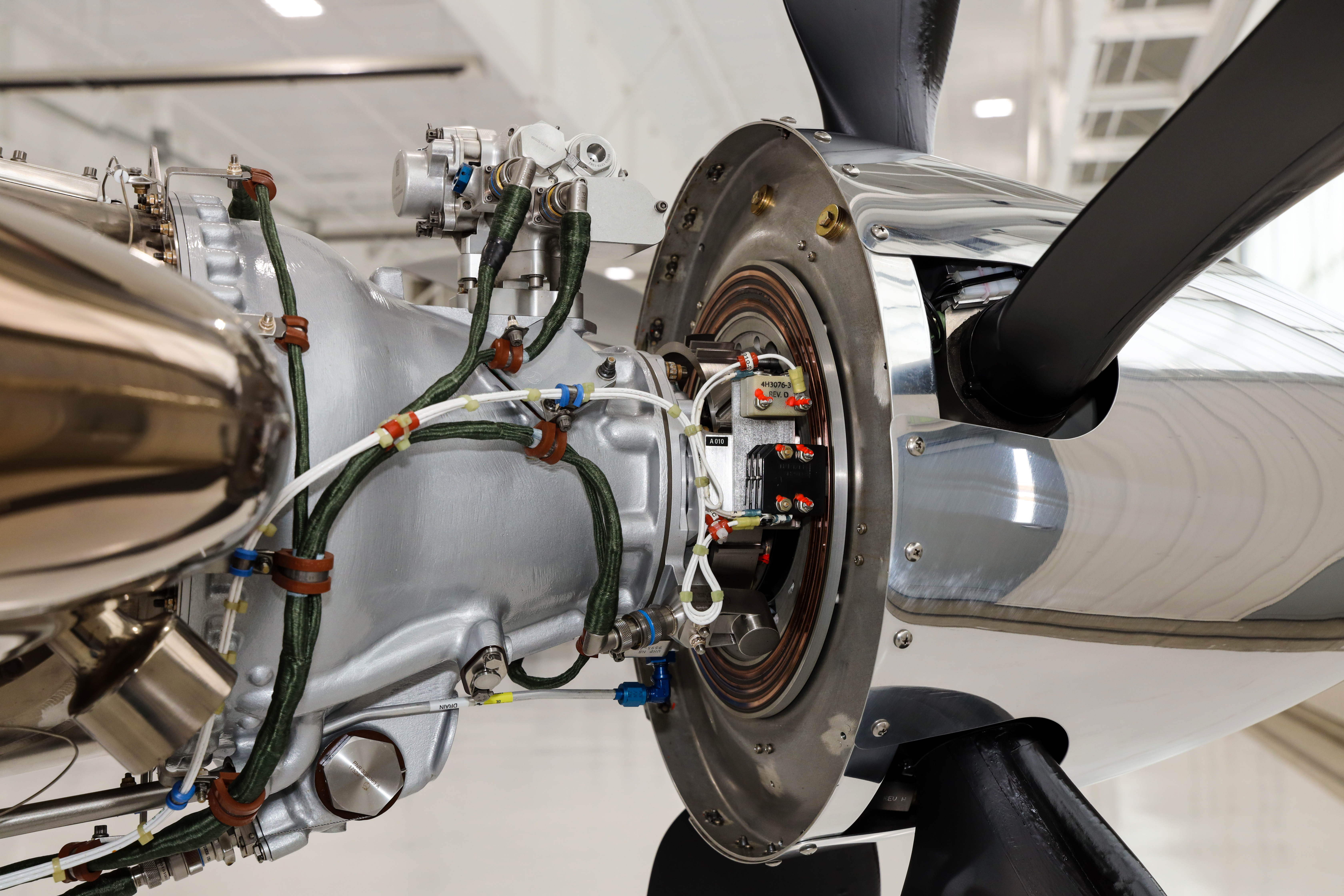 The new, digitally controlled propeller governor—dubbed “R2-D2” by some—sits atop the prop gearbox, fed only by a wiring harness.