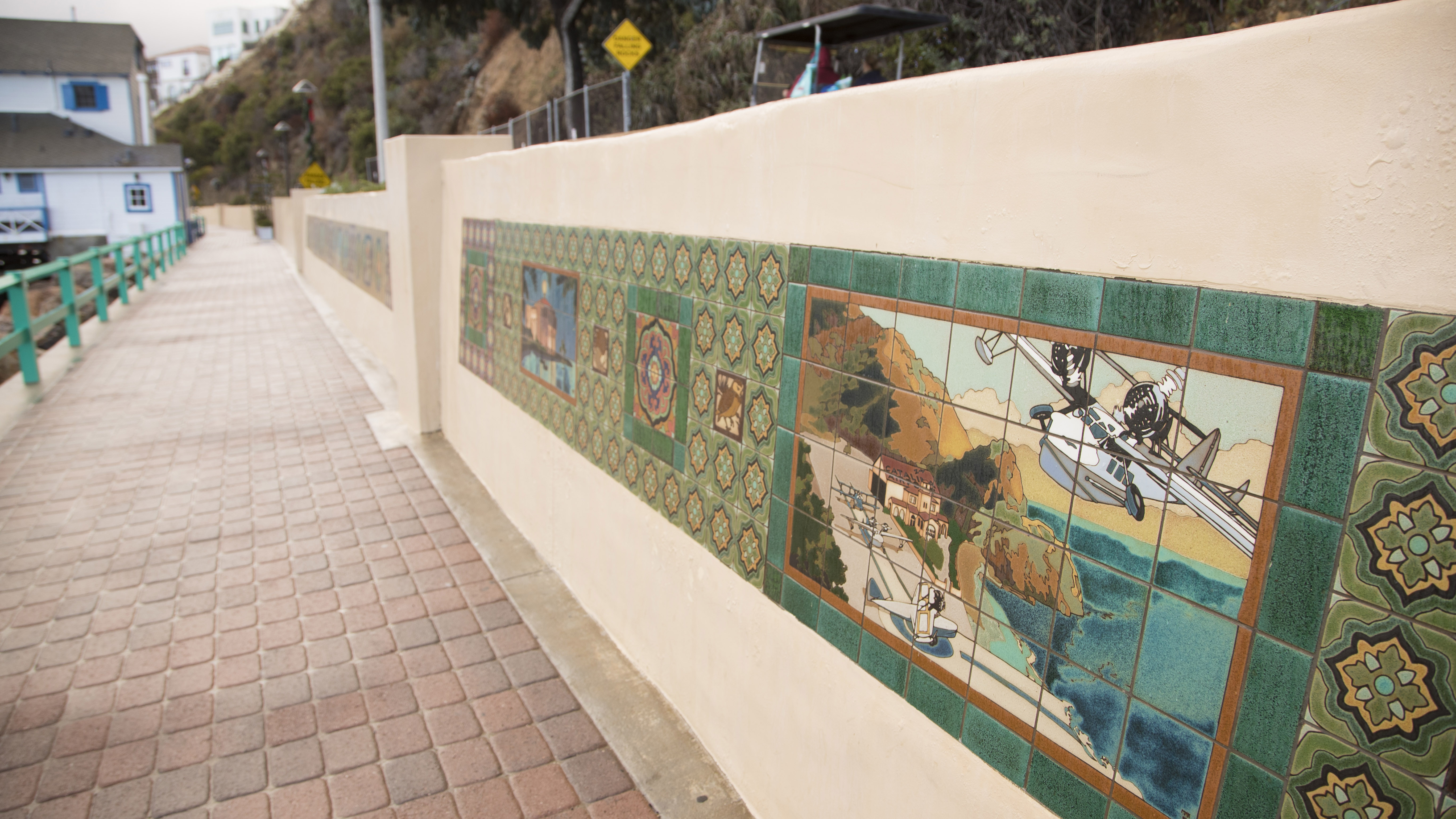 The walk to the Casino exhibits tiles showcasing the island’s history. 