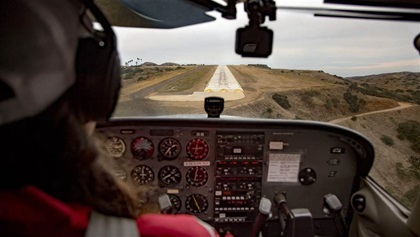 Airport in the Sky has a tricky approach with a few visual illusions. Luckily, there’s an aid to pilots in the form of a pulsating visual approach slope indicator (PVASI). The single light will show solid white when on the glideslope, solid red when slightly below, pulsating white when too high, and pulsating red when too low. How high or how low you are determines how rapidly the light flickers—the faster the flashes, the quicker you need to correct.