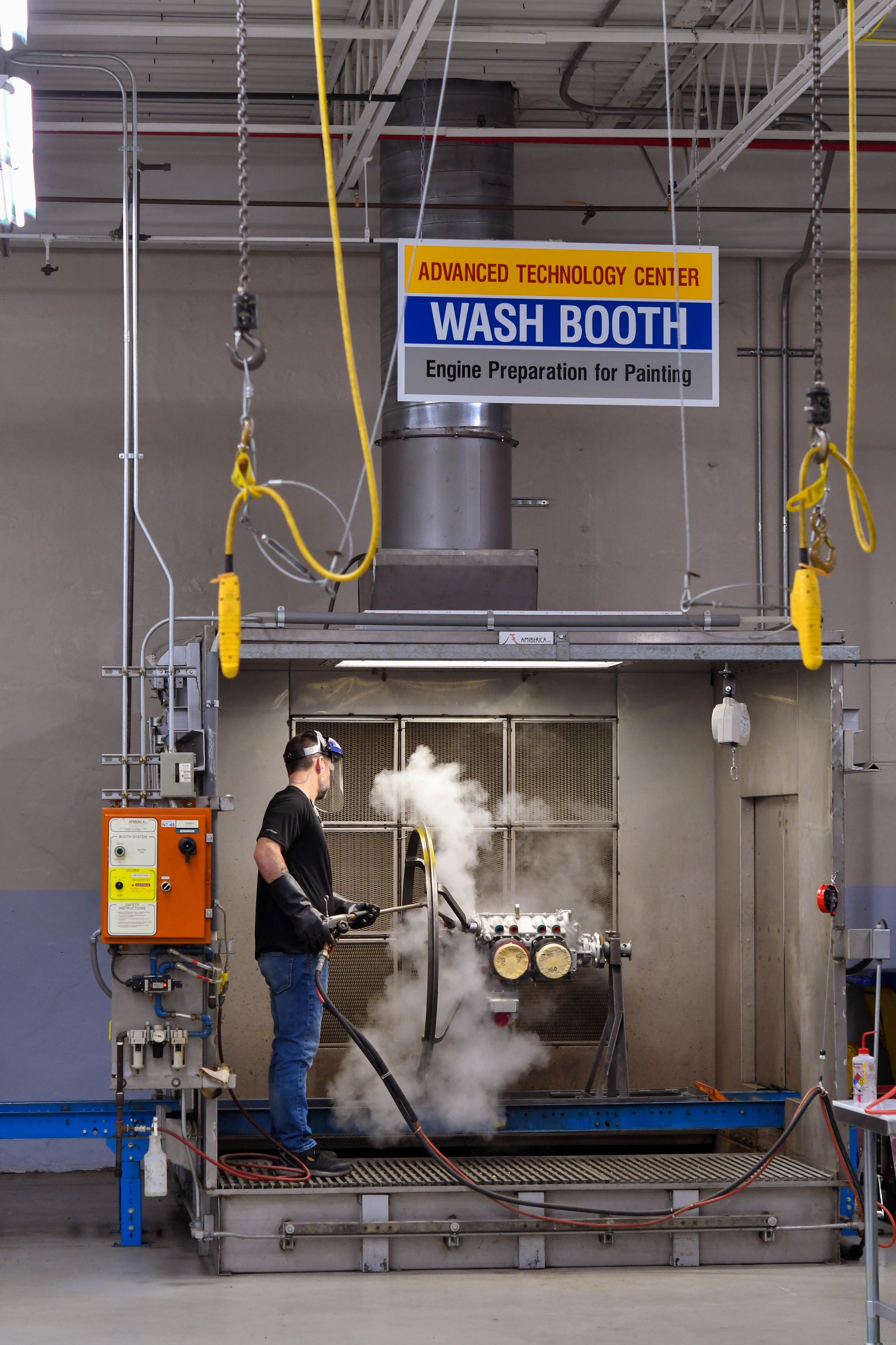An engine gets cleaned.