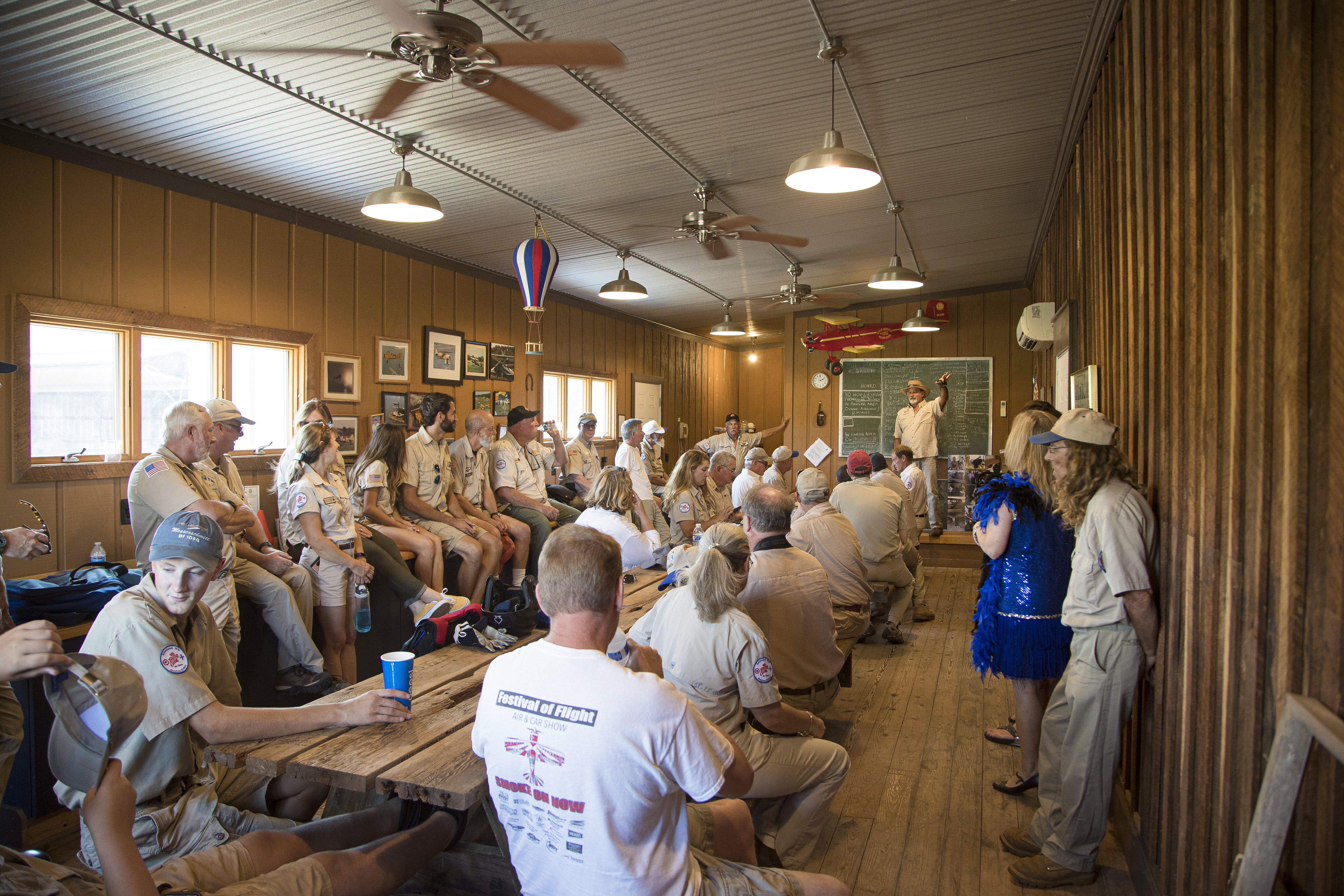 Preparations begin in the morning when the cast of characters and volunteers meet for a pilot briefing led by president Mike Truschel.