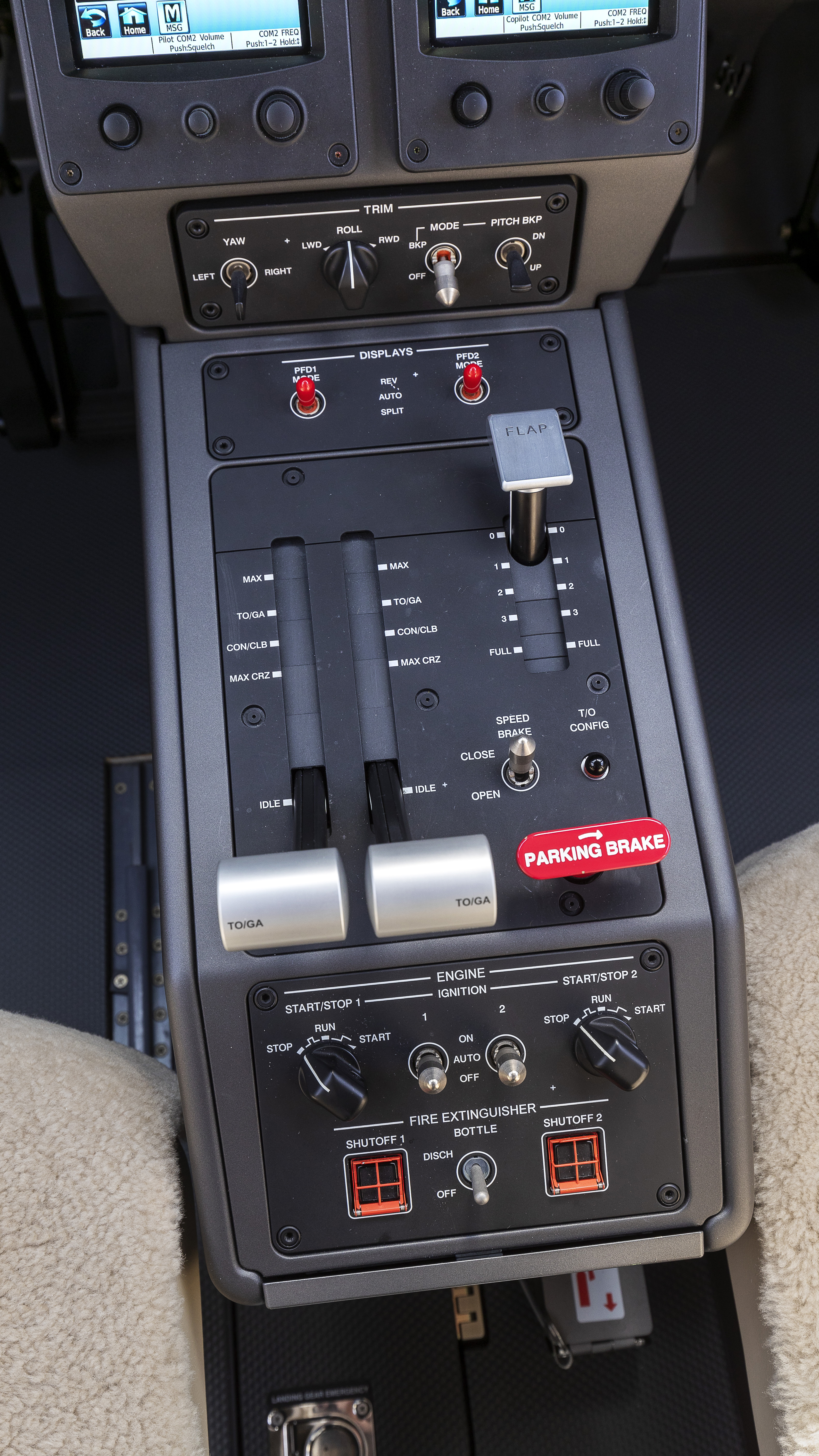 The center pedestal includes fire extinguisher controls.