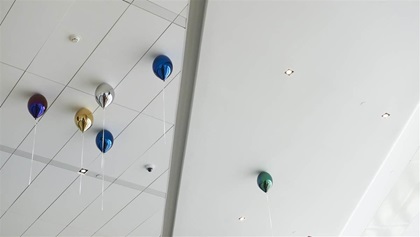 All Your Wishes" by Jeppe Hein features 70 balloon sculptures in the concourse.