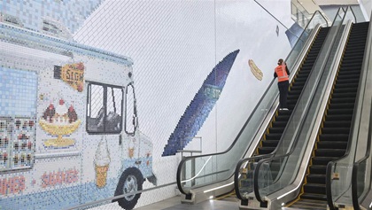 A mosaic of ceramic tiles depicts iconic New York City places such as The Stonewall Inn (above and below).