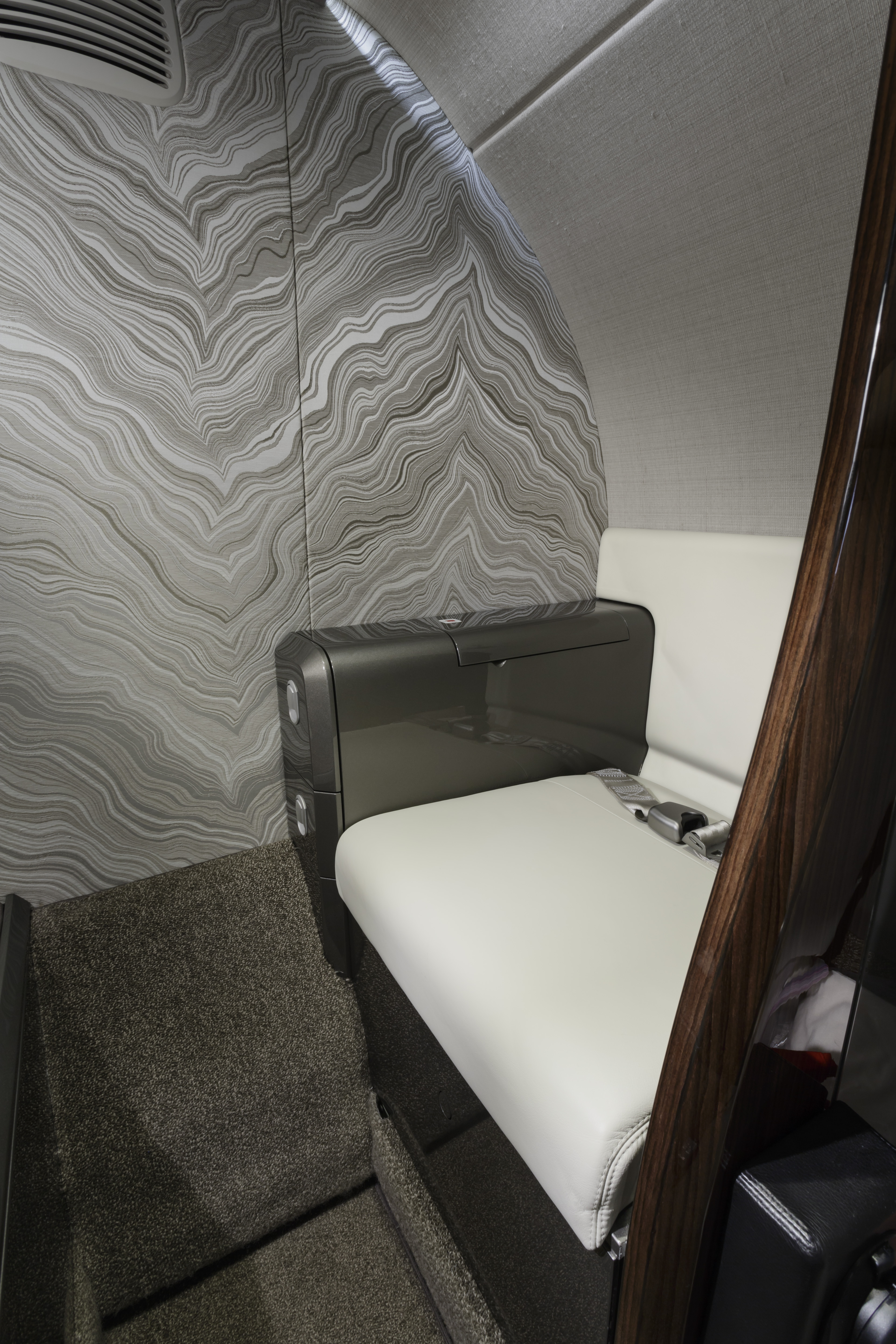 Cessna Citation M2: The essence of modesty; a Citation M2 lavatory, with belted toilet seat for the less fortunate passenger. 