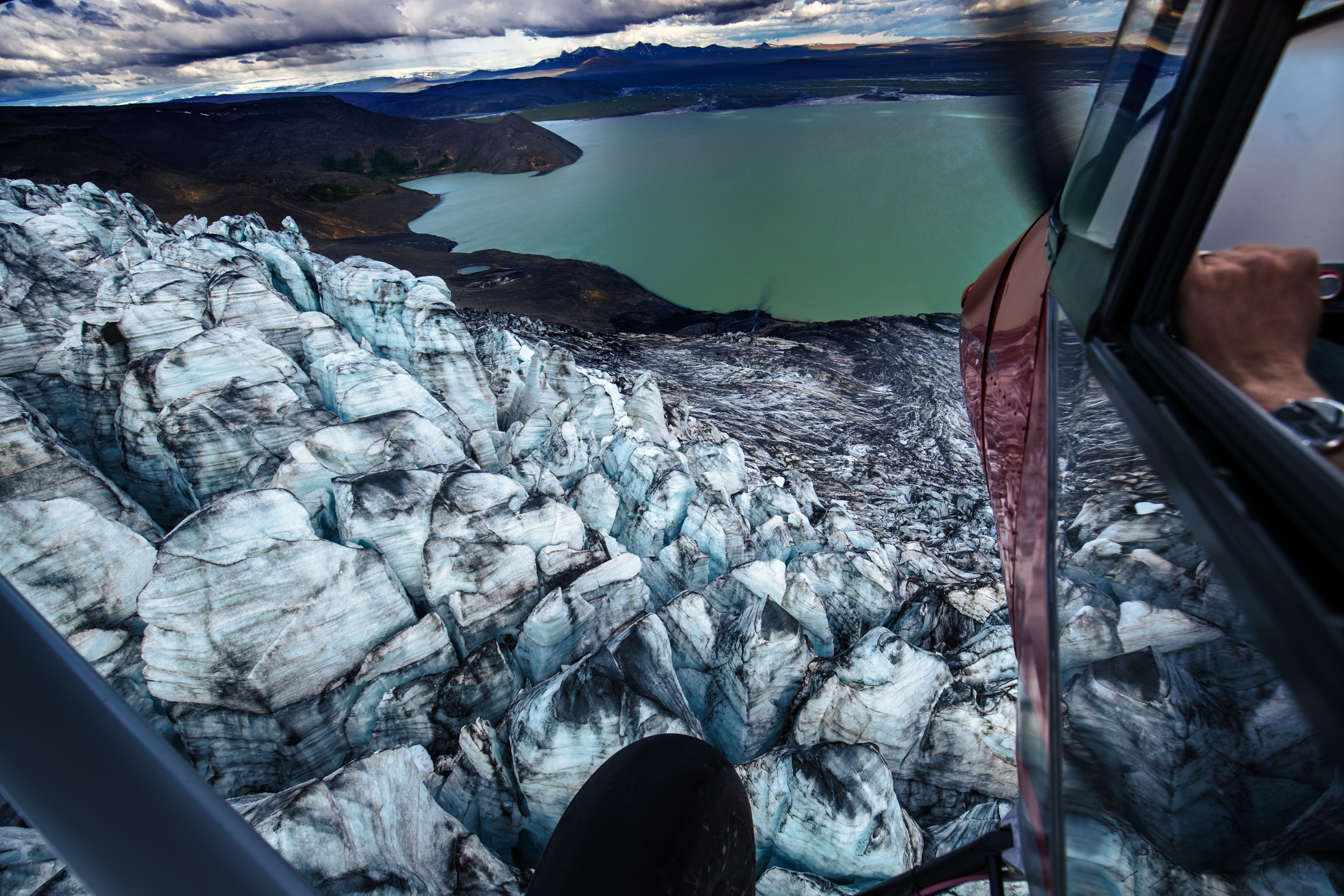 "Iceland Calls," March 2018 ‘AOPA Pilot’: Arnar Emilsson pushes his Supercruiser over the edge of Langjokull glacier as it flows into Hvitarvatn Lake. (Canon 1D X mk II, 16mm, 1/1000, f/6.3, ISO 400)
