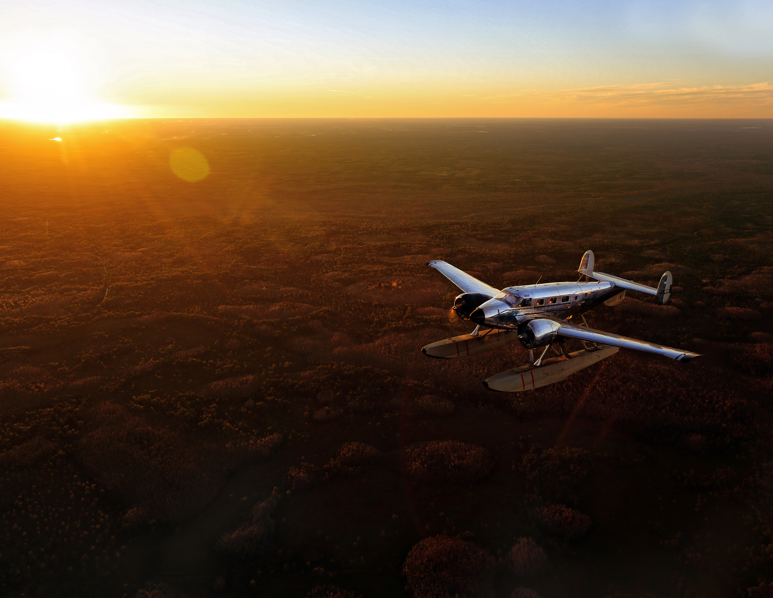 “Time Traveler,” April 2014 'AOPA Pilot': A Beech 18 on straight floats reflects the last light before sunset above the Florida marshland. (Canon 5D mk III, 24mm, 1/80, f4.0, ISO 125)