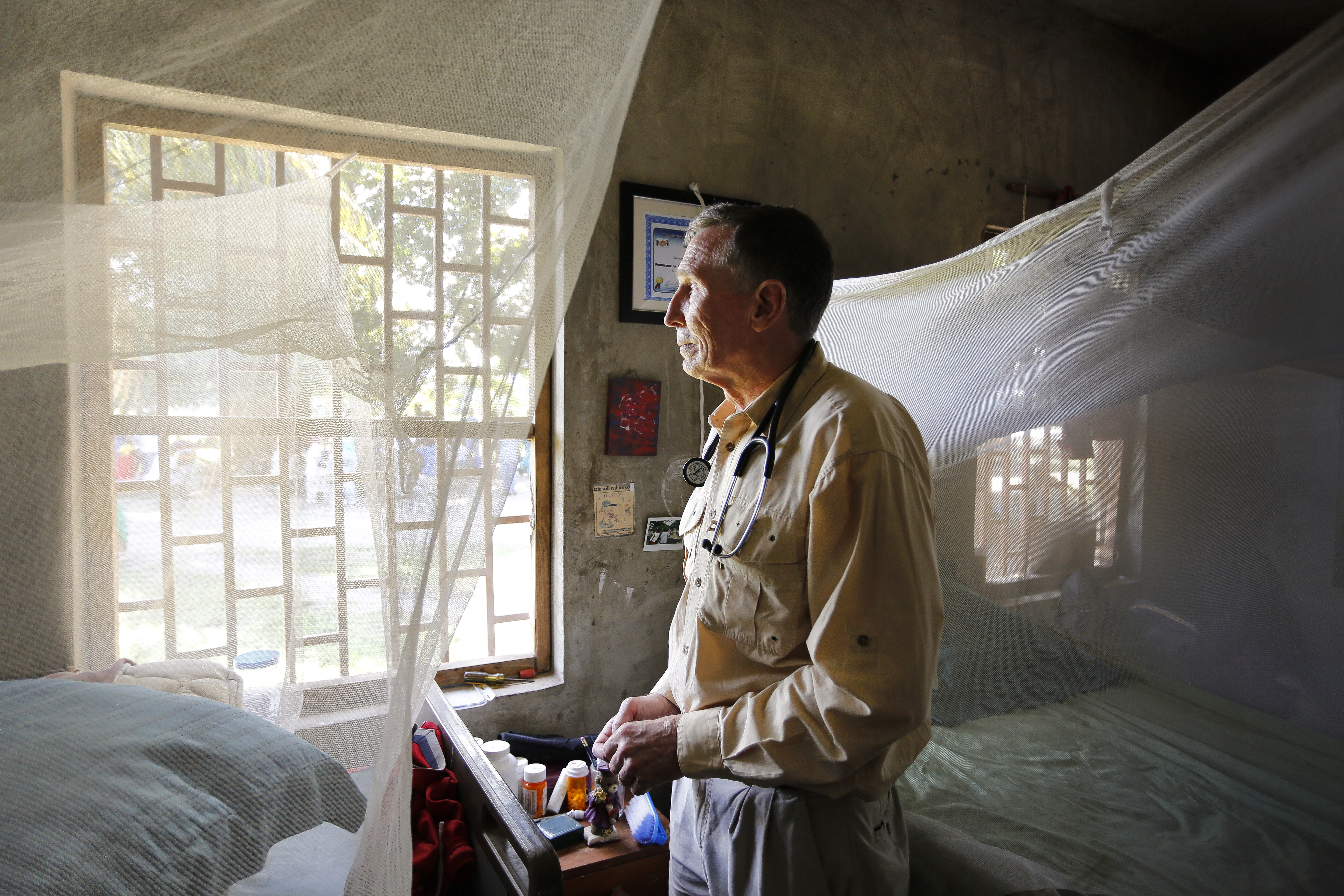 “One Patient at a Time,” August 2015 'AOPA Pilot': Dr. Randy Rizor awaits his next patient at a clinic in Cap Haitien, Haiti. (Canon 5D mk III, 22mm, 1/40, f4.0, ISO 500)