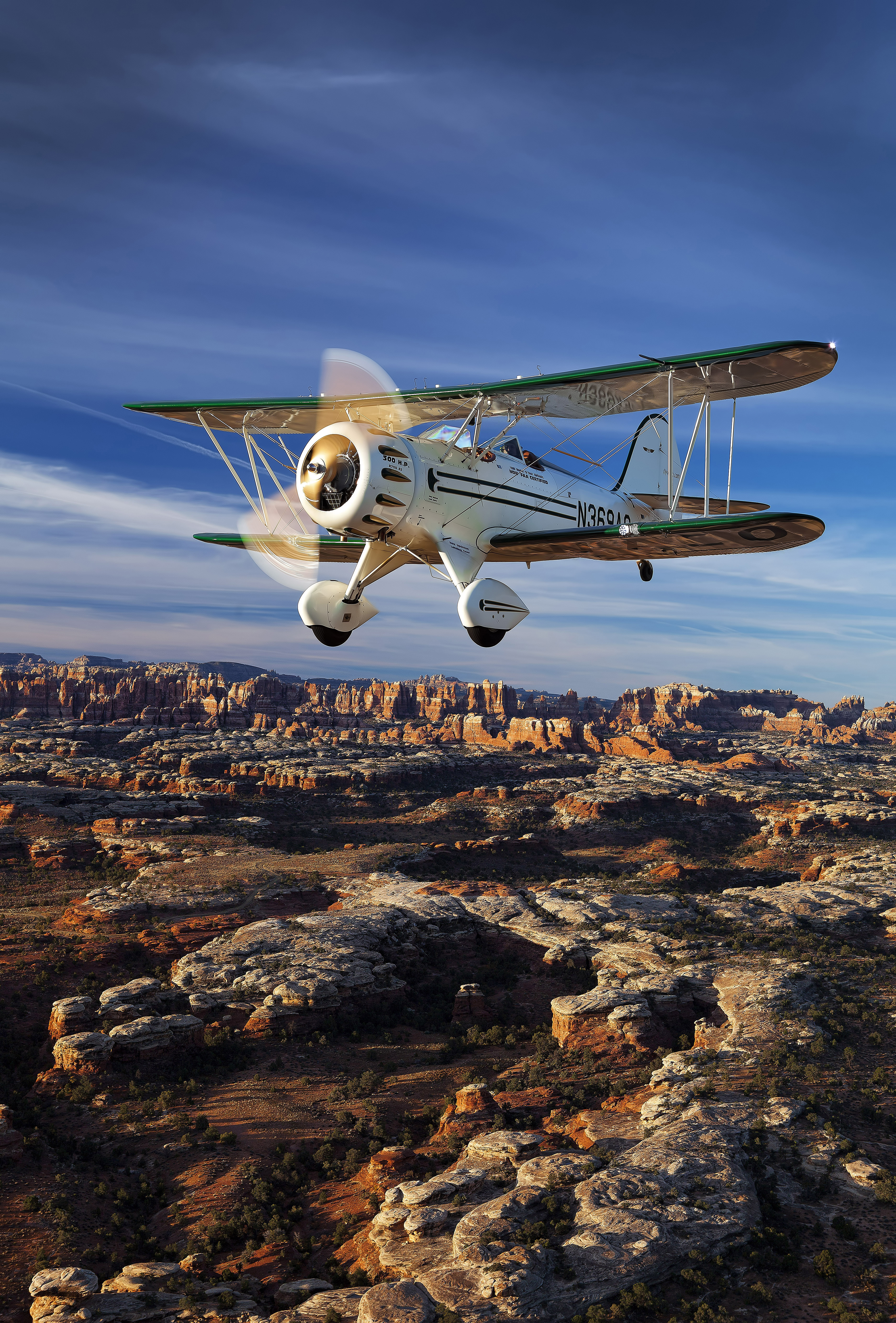 “88 Magical Aerial Miles,”August 2011 ‘AOPA Pilot’: A WACO YMF-5D catches the first morning light over Canyonlands National Park near Moab, Utah. (Canon 5D mk II, 50mm, 1/160, f9.0, ISO 400)
