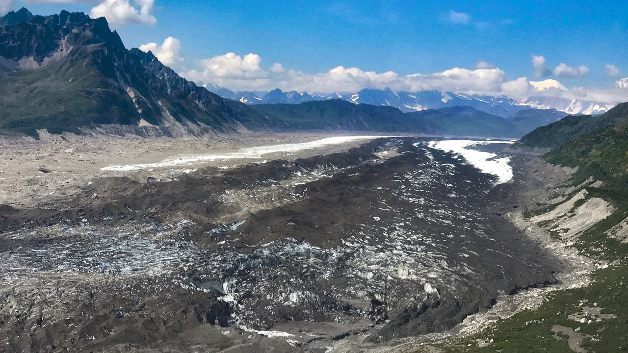 Ruth Glacier Alder Creek, 2000: Brian Okonek photographed the Alaska Range throughout his extensive mountain guiding career. Brian and his father, Jim Okonek, took many flights together studying the glaciers. Over time, the Ruth Glacier receded and the lake here drained.
