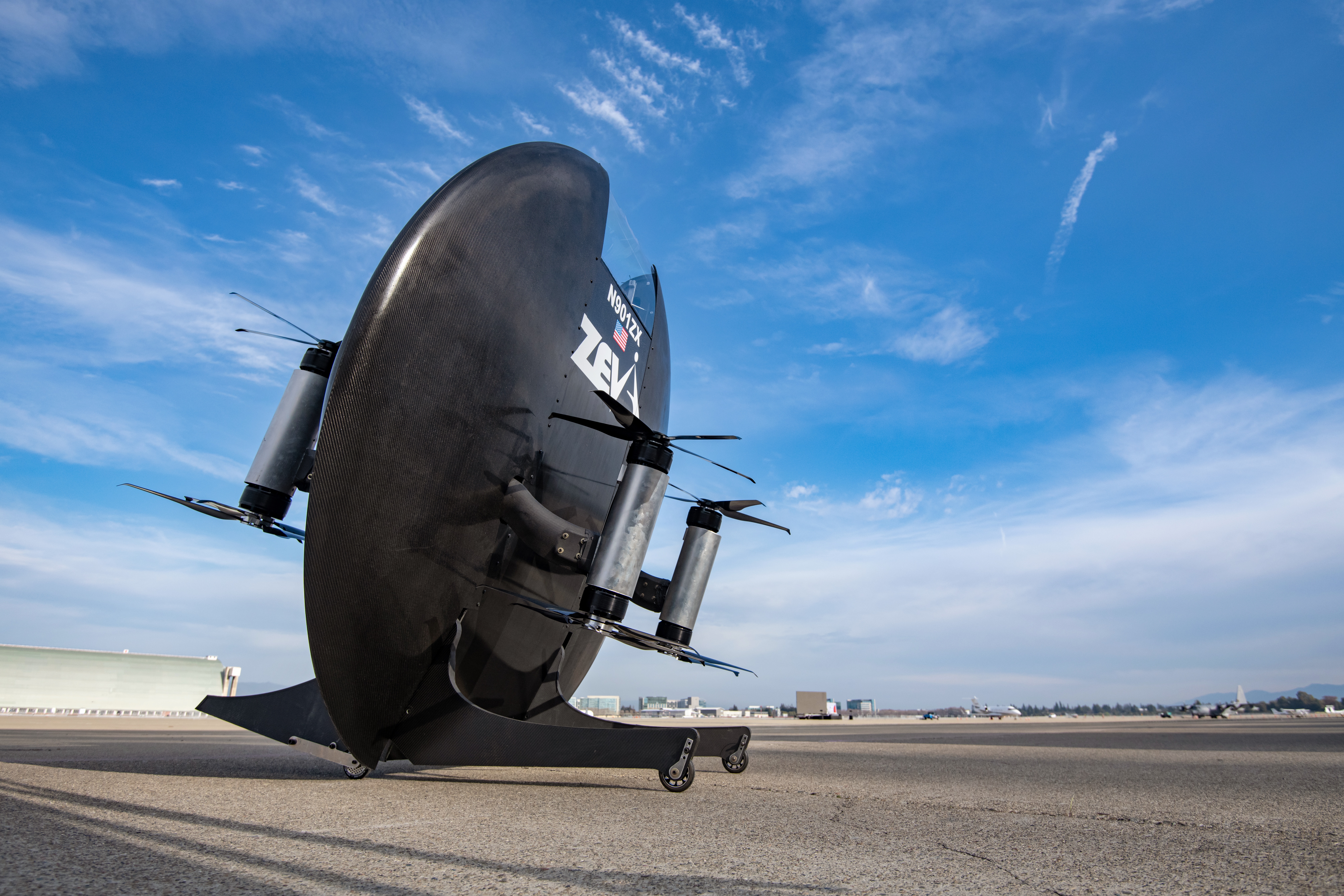 The Zeva Zero personal air vehicle is displayed at the GoFly Prize Final Fly Off, at Moffett Federal Airfield in Mountain View, California. The design combines eight electric motors with a flying wing. 