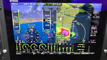 Deviating right over the Gulf of Mexico to avoid a thunderstorm near Brookville, Florida.