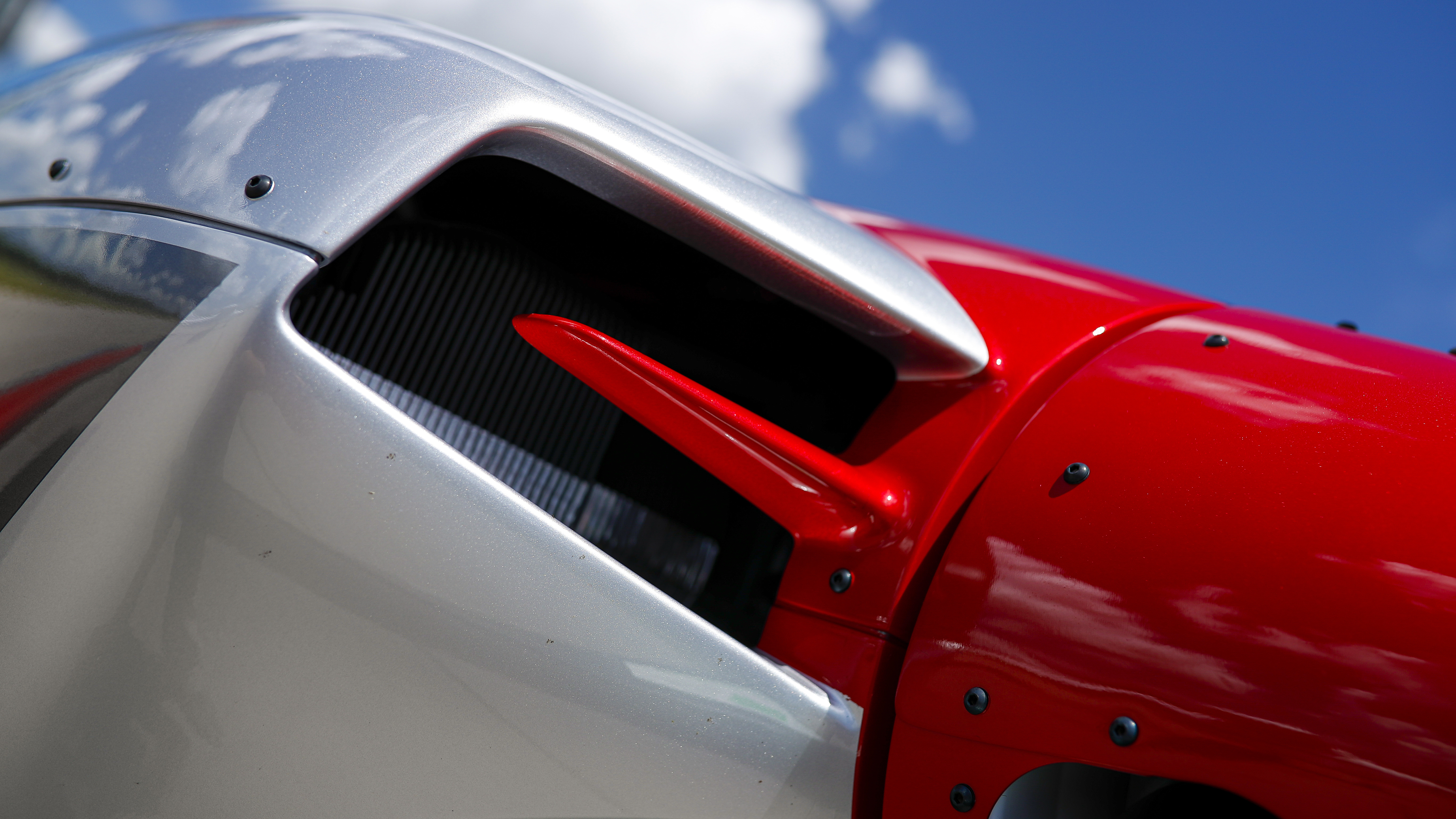 An aerodynamic shape directs cooling air to the cylinders at high angles of attack.  