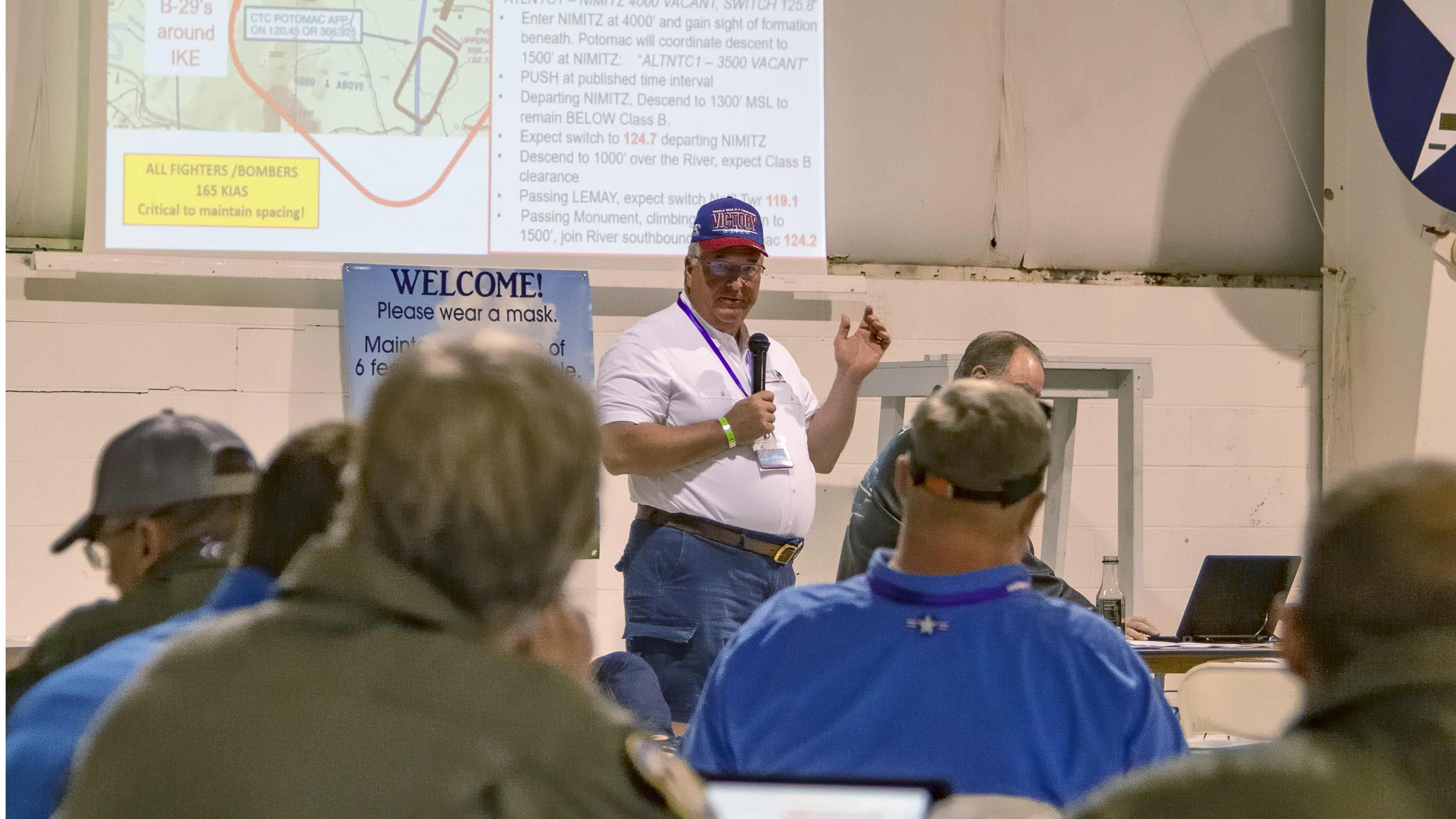 Arsenal of Democracy Air Boss Mike Ginter briefs pilots.