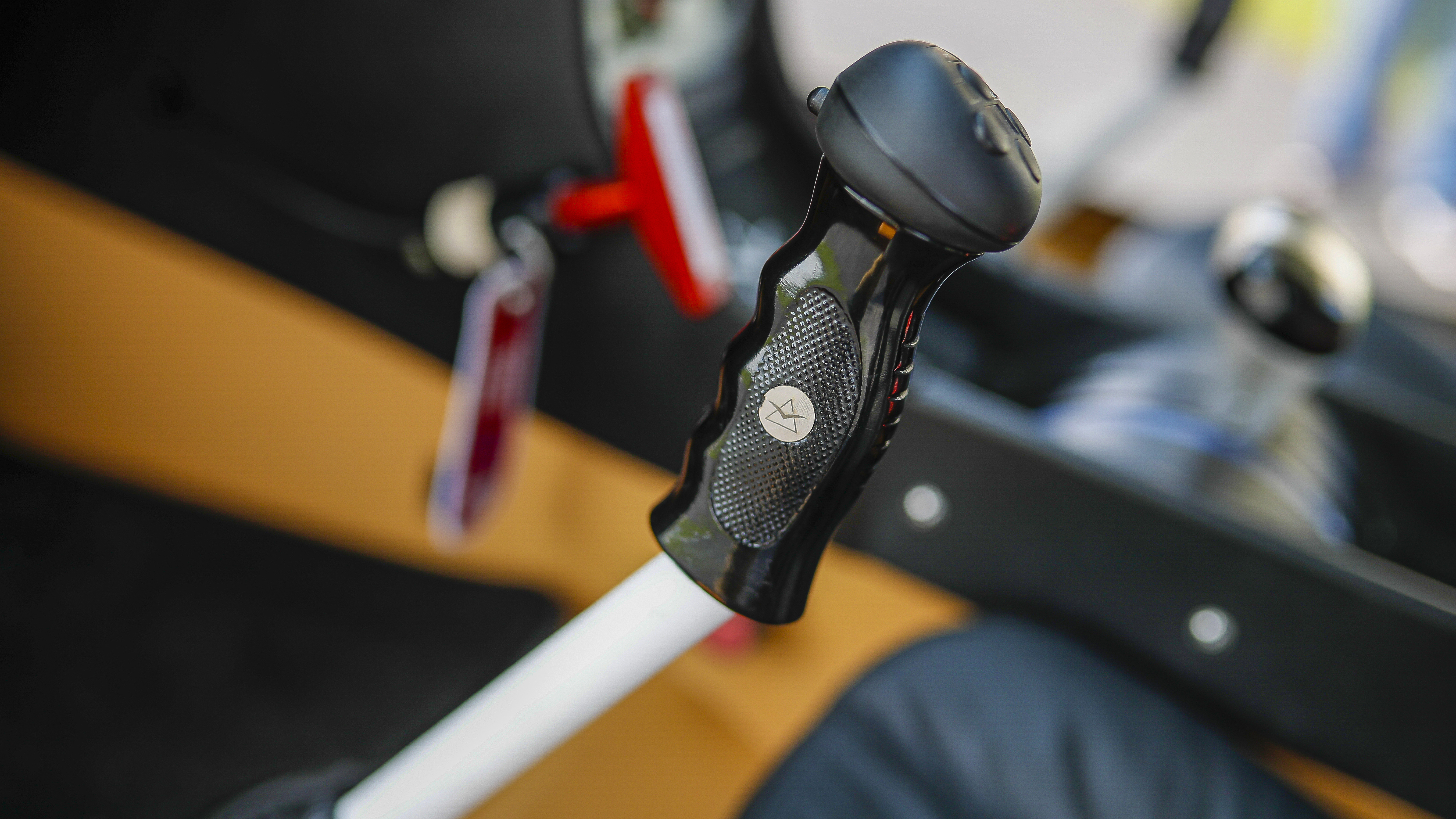 Control stick has electric trim switches, an autopilot disconnect switch, and a push-to-talk switch.