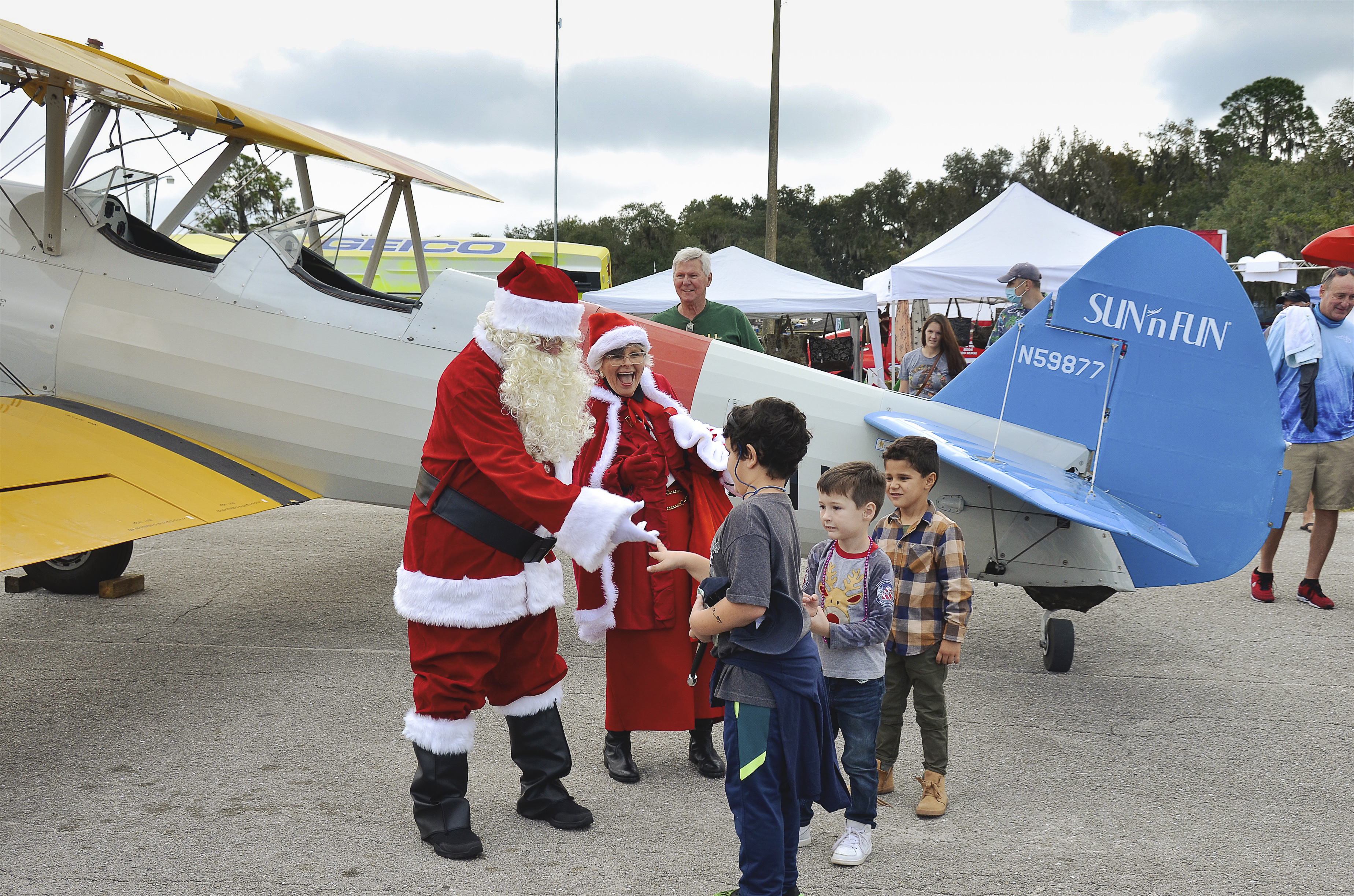 Aviators don't usually associate Santa Claus with the sunshine and festivities of Sun ’n Fun. But in these unprecedented times, even old Saint Nick is using general aviation to get around. Santa and Mrs. Claus arrived in a 1941 Stearman PT–17 to greet eager—and somewhat skeptical—children. Once they got over his nonstandard arrival (where was the Rudolph-led sleigh?), scores of youngsters lined up to offer their Christmas wish lists as their parents listened closely.