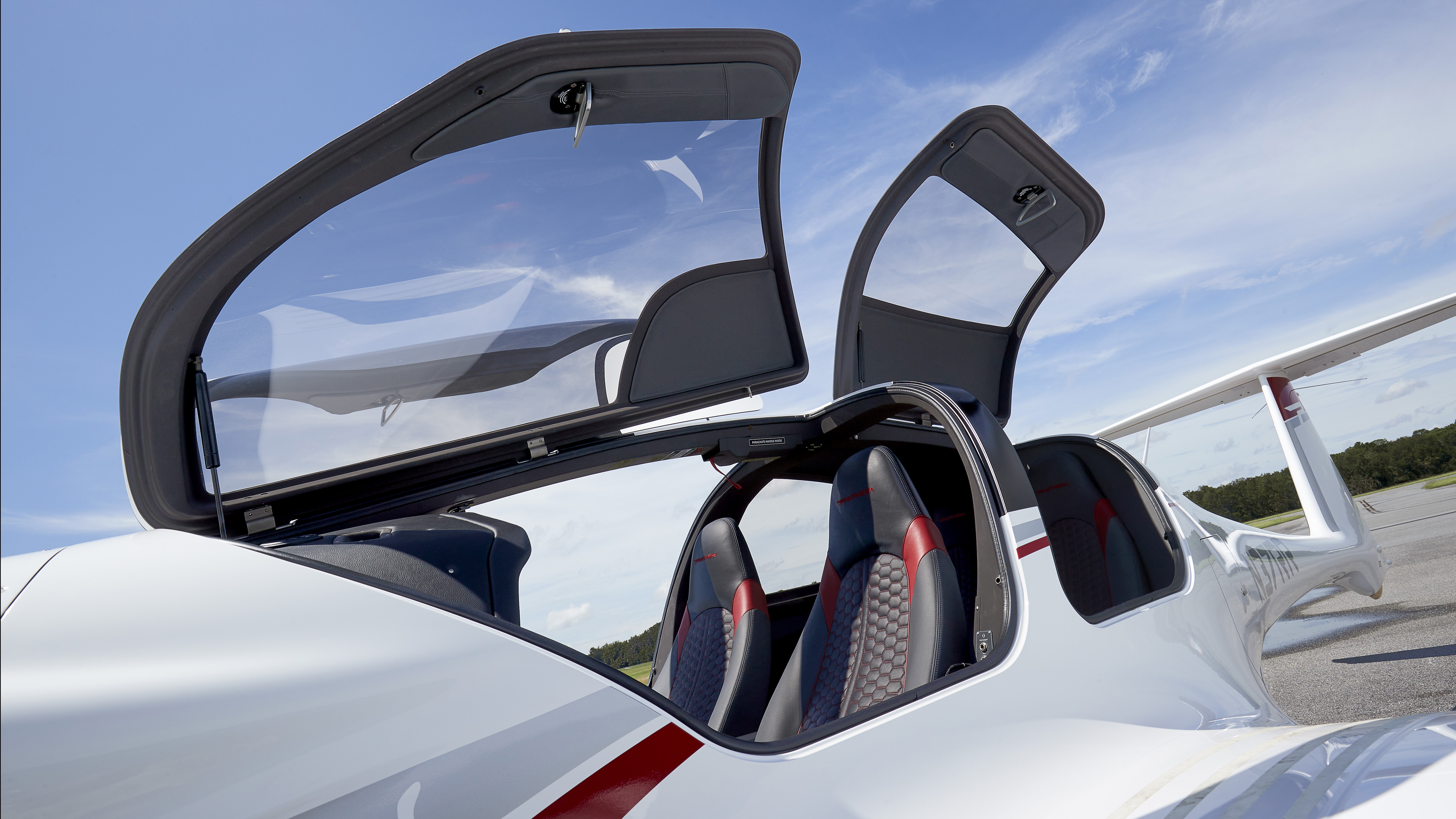 Front and rear gull-wing style doors for easy entry.