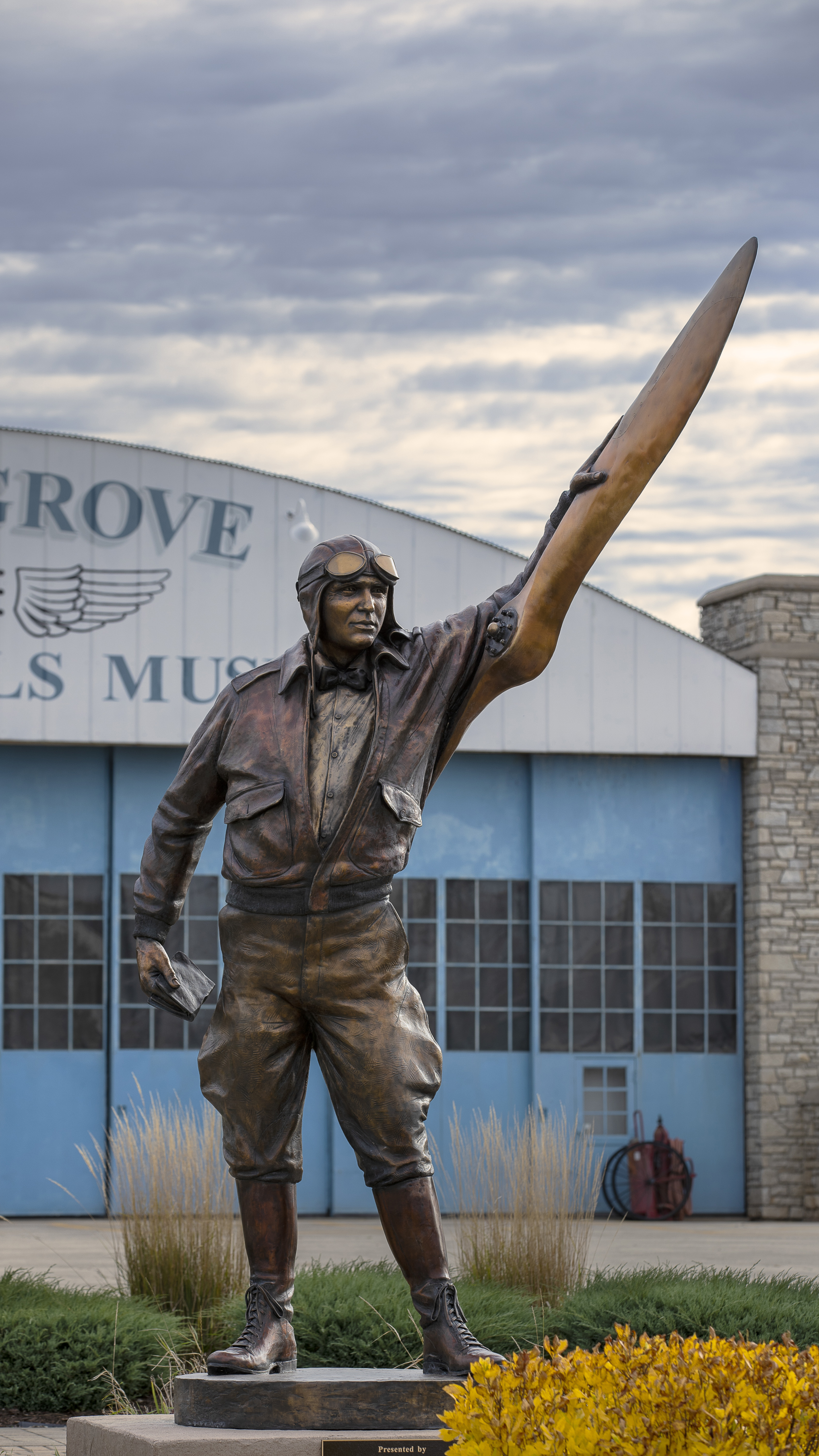 A statue in front of the Poplar Grove Museum.