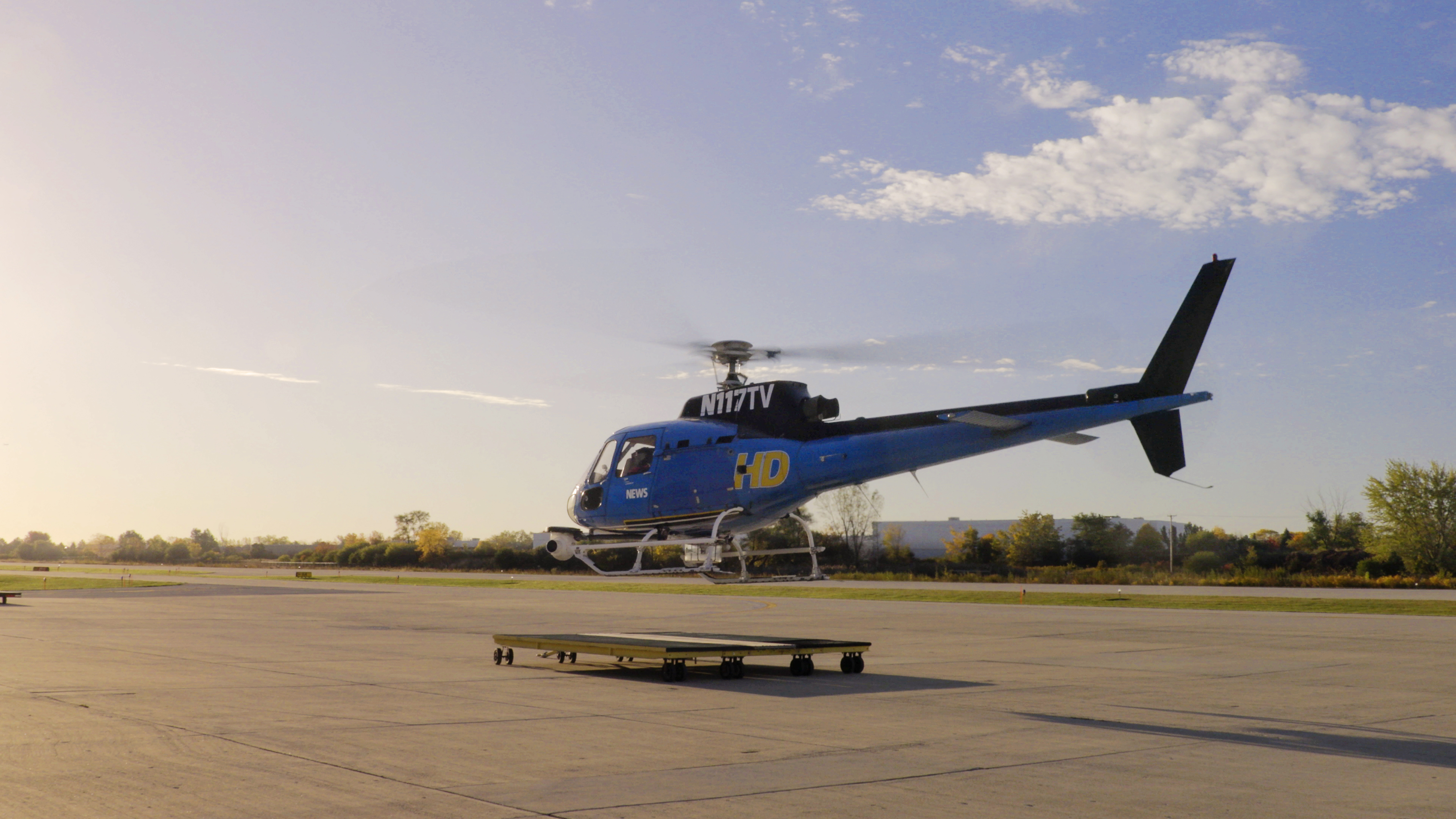 An Airbus H125 helicopter, call sign “Chopper 7,” lifts off to cover early morning breaking news for Chicago residents.