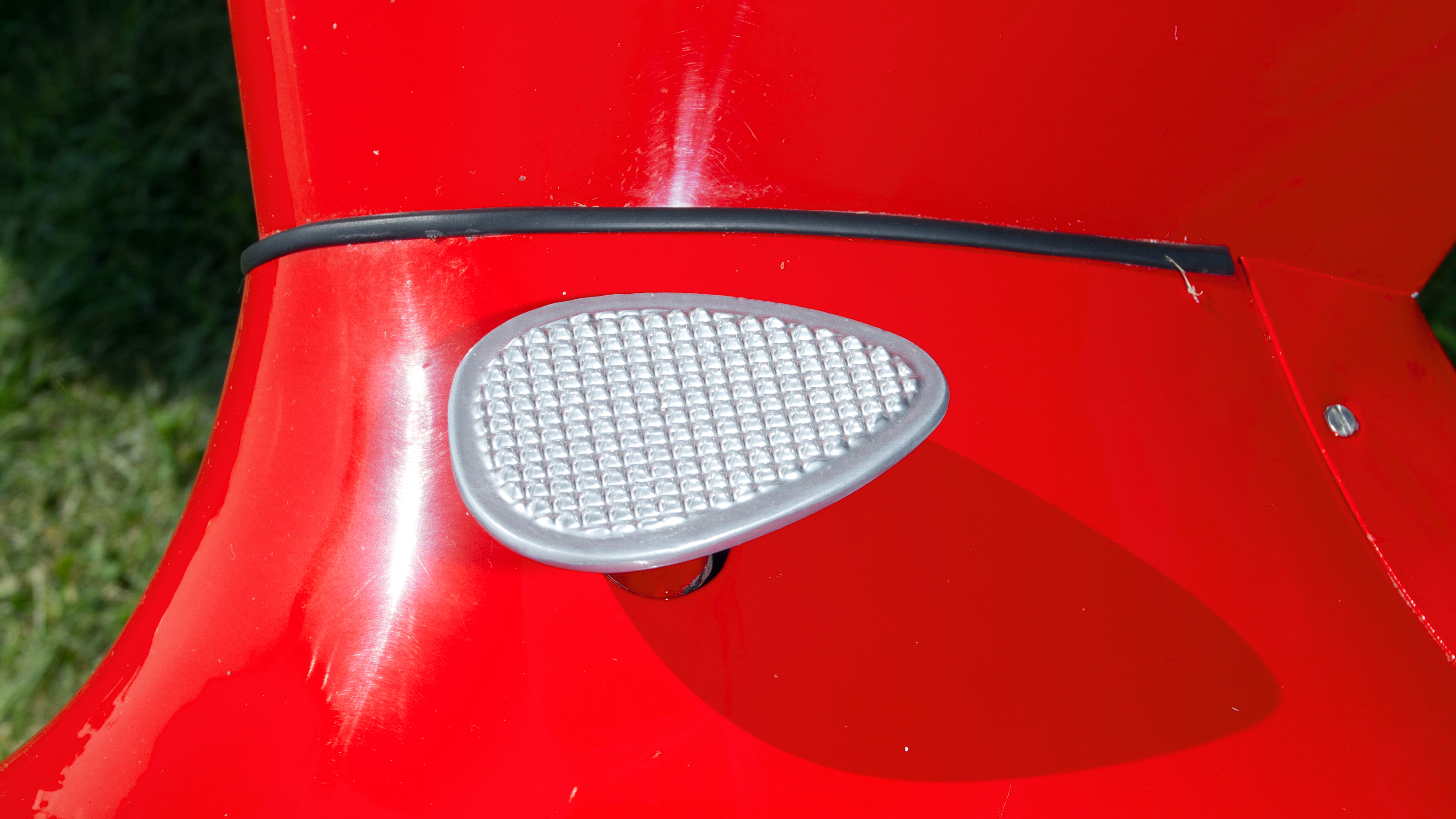 Ready to receive a two-tone elkskin Oxford, a solid footstep is mounted on top of the wheelpant.