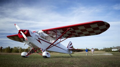 Todd Crist gives his son Cory flight training lessons in the family Piper Cub.Cook Airfield (K50)Derby KS USA