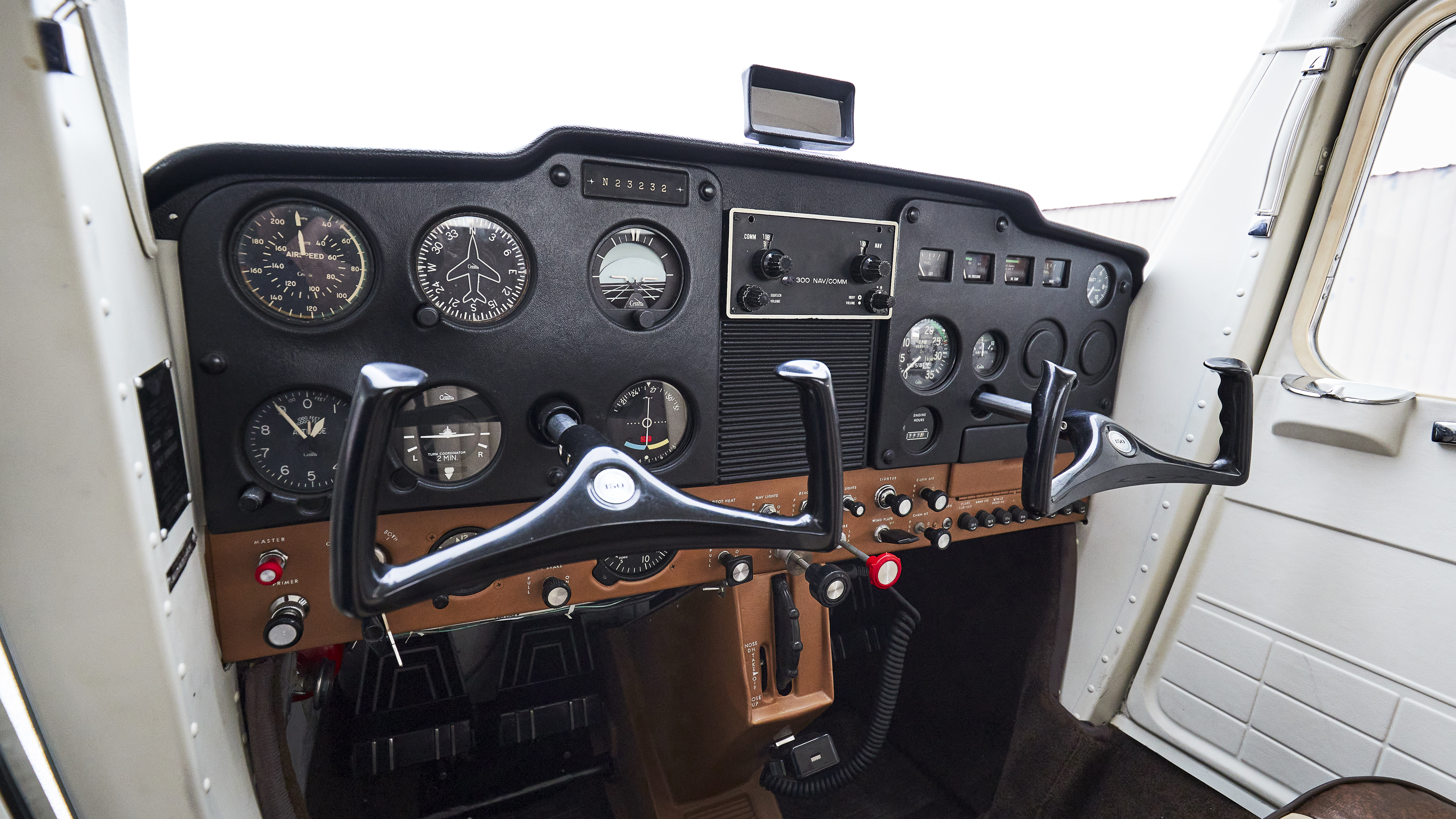 A stunningly original instrument panel, right down to the factory-installed Cessna 300 nav/com radio (Ozment slides in a modern radio when the aircraft is not being displayed at airshows).