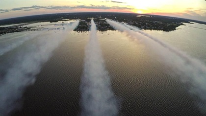 The lead pilot calls for “smoke on” during the final run-in about one mile before the target. Some of the group’s airplanes are equipped with pyrotechnics for twilight and night displays. Photo by Wanda Jackson