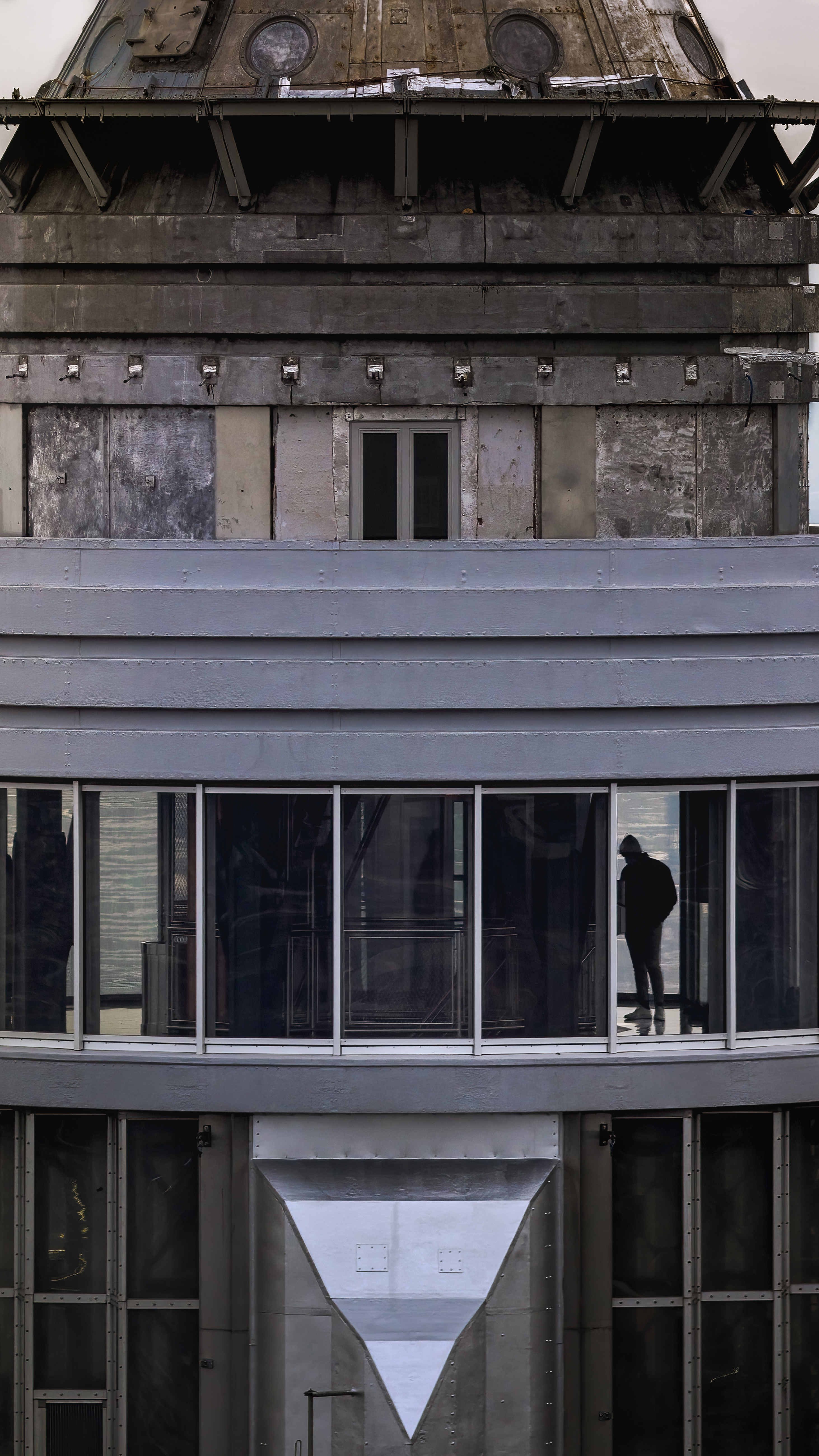 The newly renovated  Empire State Building 102nd floor observatory from a Robinson R44 helicopter. "We were circling and I'm now looking for things we haven't seen before. Instead of using a wide angle, I was shooting at 200mm for a tighter view, and I happened to see a quick silhouette. I asked the pilot to make one more loop and was fully locked in with my exposure."