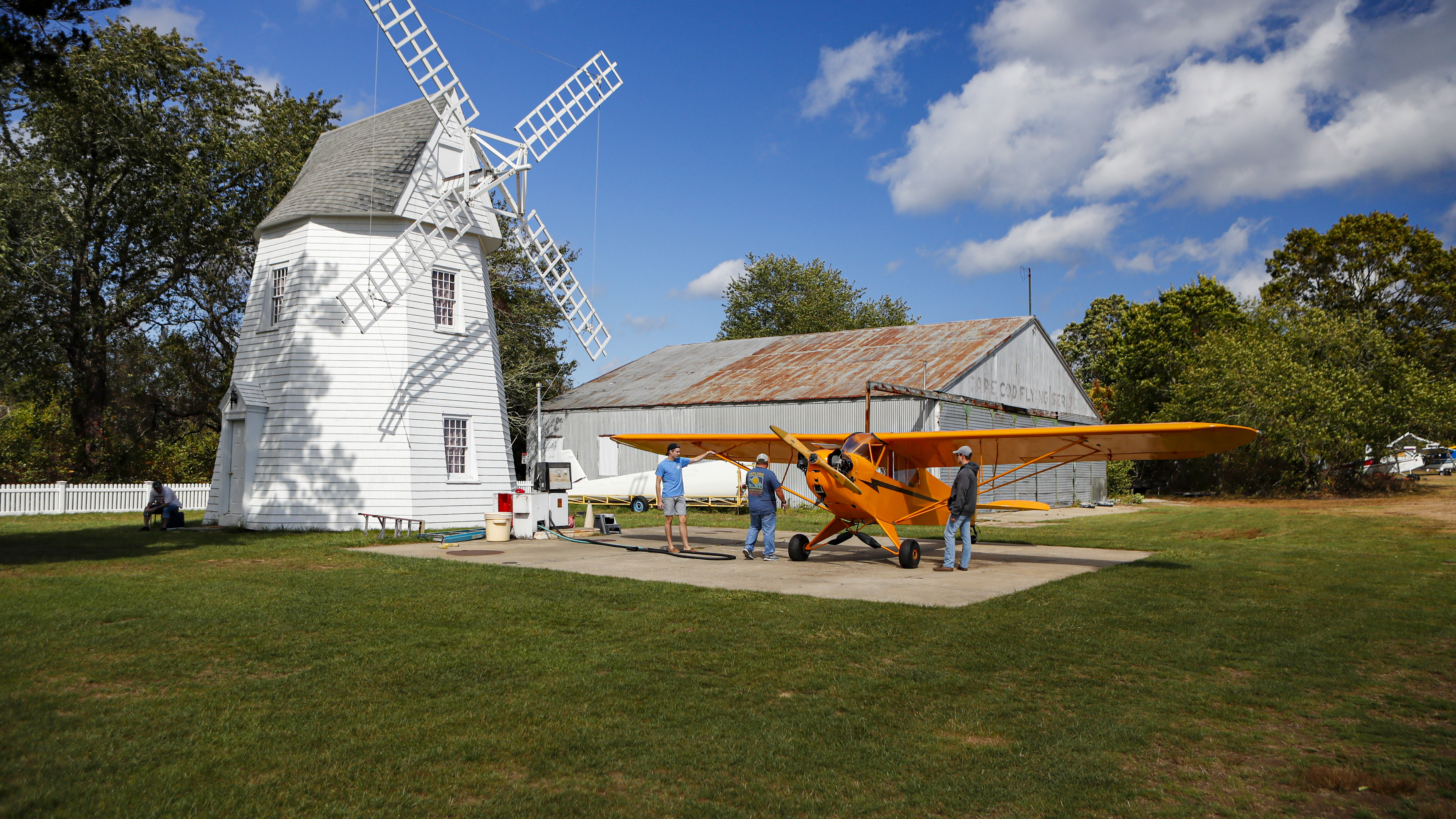 The windmill is original to the property; it was probably built around 1930 and was designed to look like the William Danforth family estate’s gate house. The Cub is one of the 11 aircraft the Siderwiczes own. There are 25 aircraft based at the airfield. The hangar is also original.