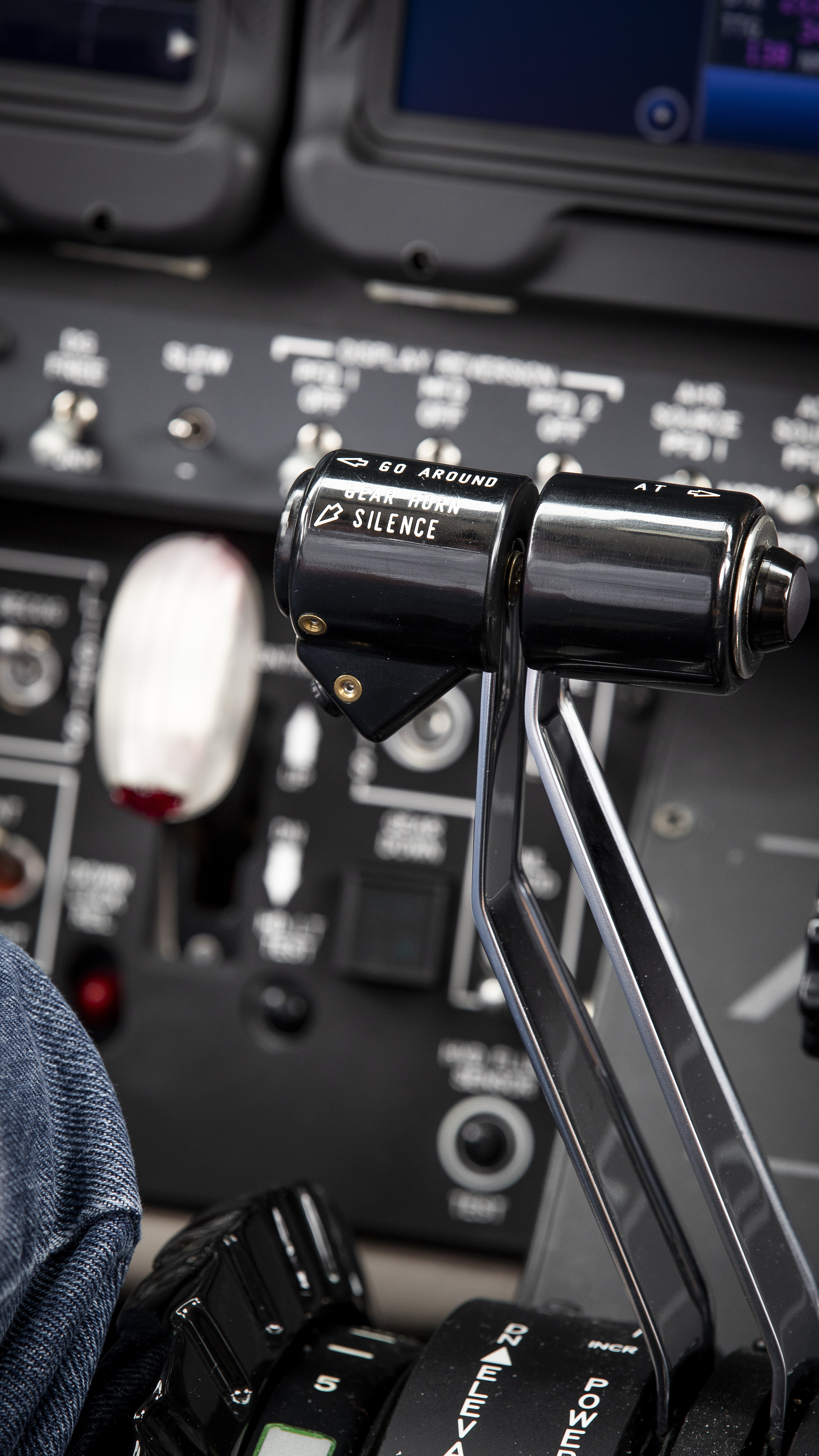 Go-around and AT buttons on the power levers are for engaging and disengaging the autothrottles.