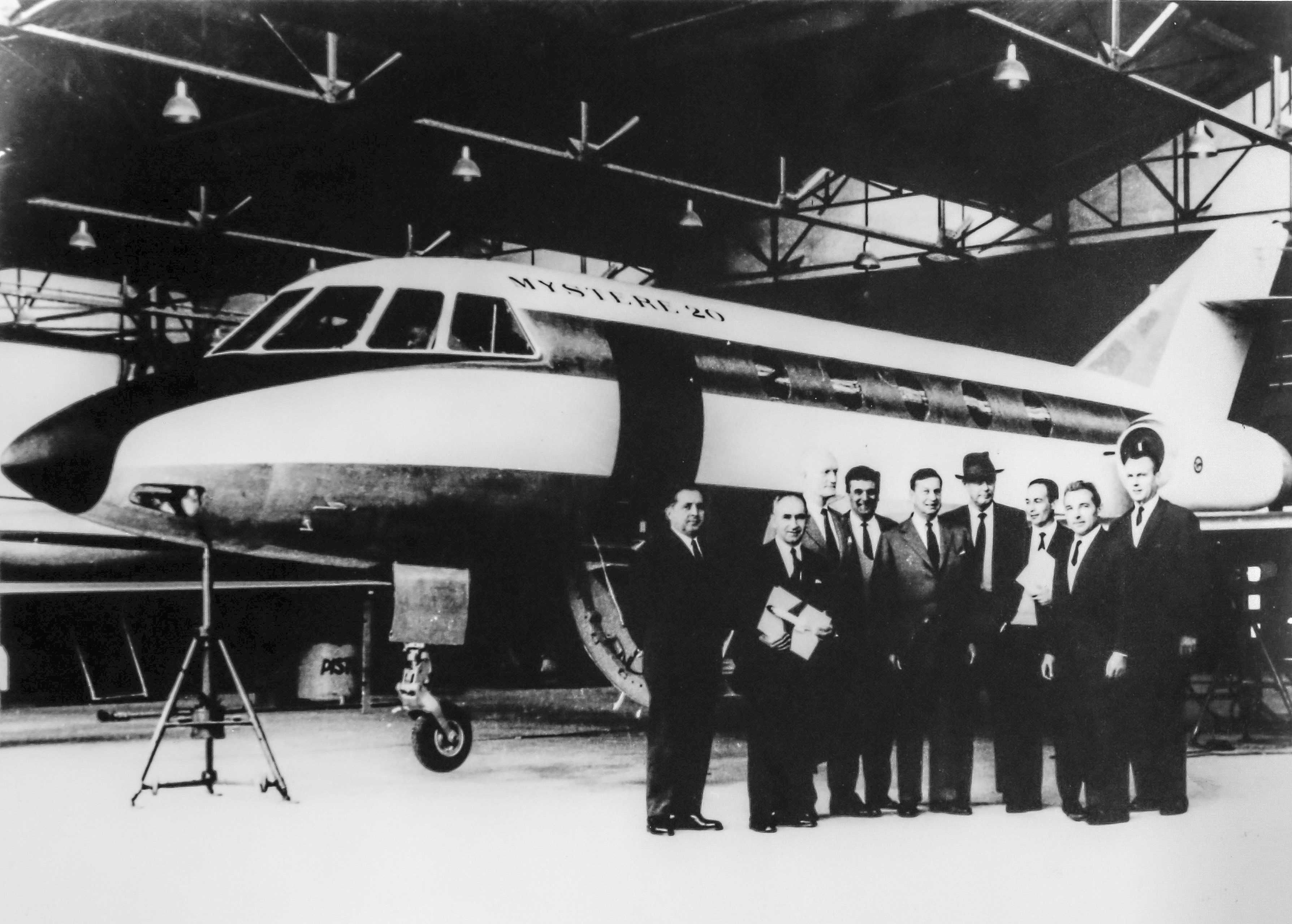 The Falcon 20—known as the Mystère 20 in its early days— gets chosen for Pan American Airways’ business jet division by Charles Lindbergh (right, wearing hat). (HERITAGE MORANE-SAULNIER DAHER)