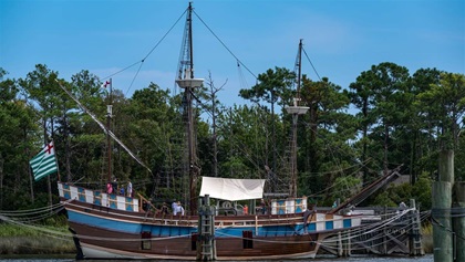 Across from the downtown Manteo waterfront floats Elizabeth II at its home port at Roanoke Island Festival Park. The ship represents one of the English merchant vessels from the Roanoke Voyage of 1585.