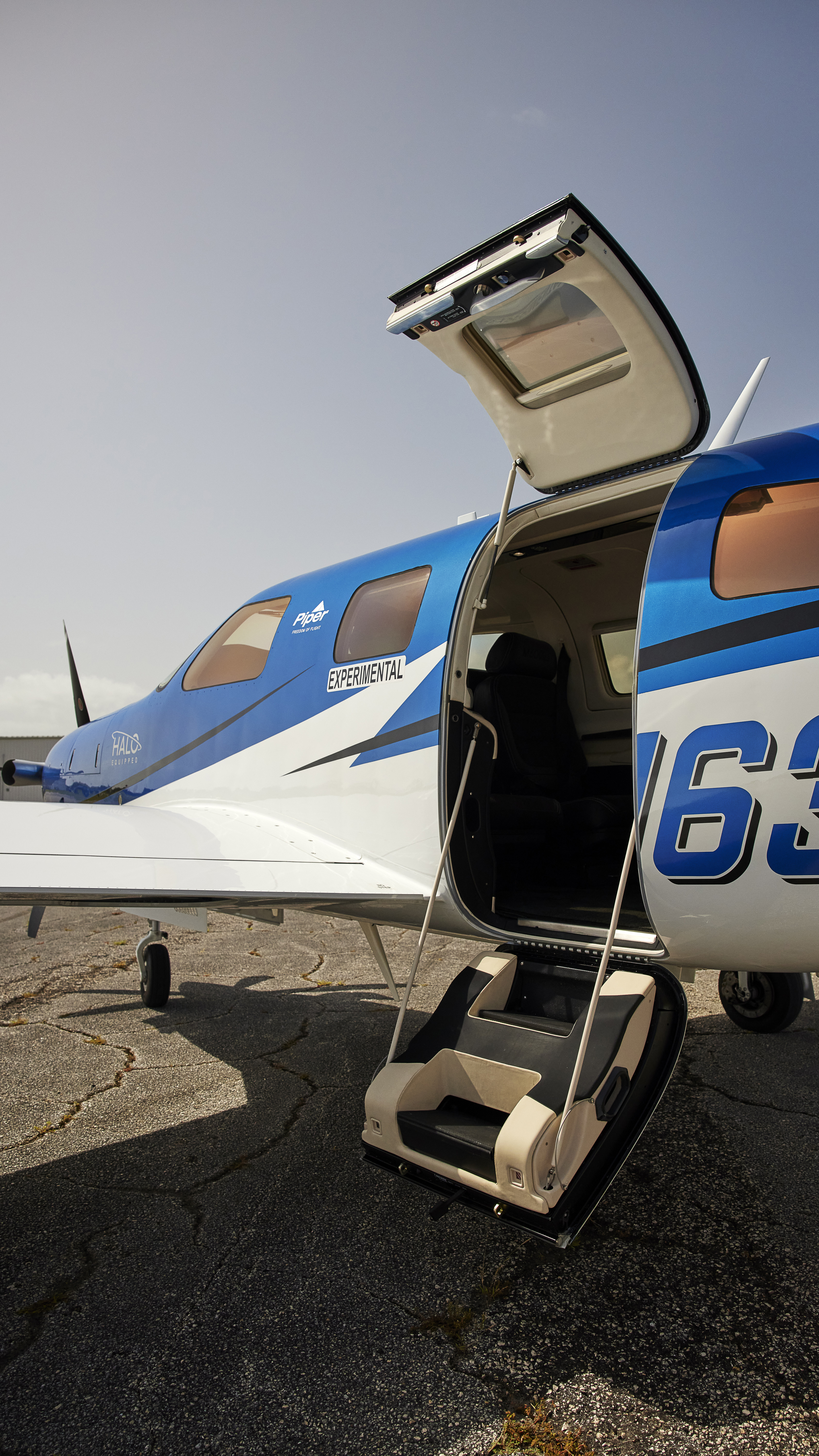 Clamshell entry doors mark all of Piper’s M-series cabins. The “experimental” designation on this demonstrator airplane was required because its autoland software allows the pilot to make manual airport selections, bypassing the autoland system’s choice and suppressing ATC broadcasts and the 7700 squawk code.