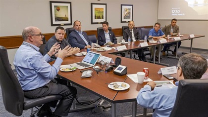 Presage Group’s Martin Smith, (left) briefs CJ pilots, FlightSafety staff, and CJ Pilots association staff on go-around techniques.