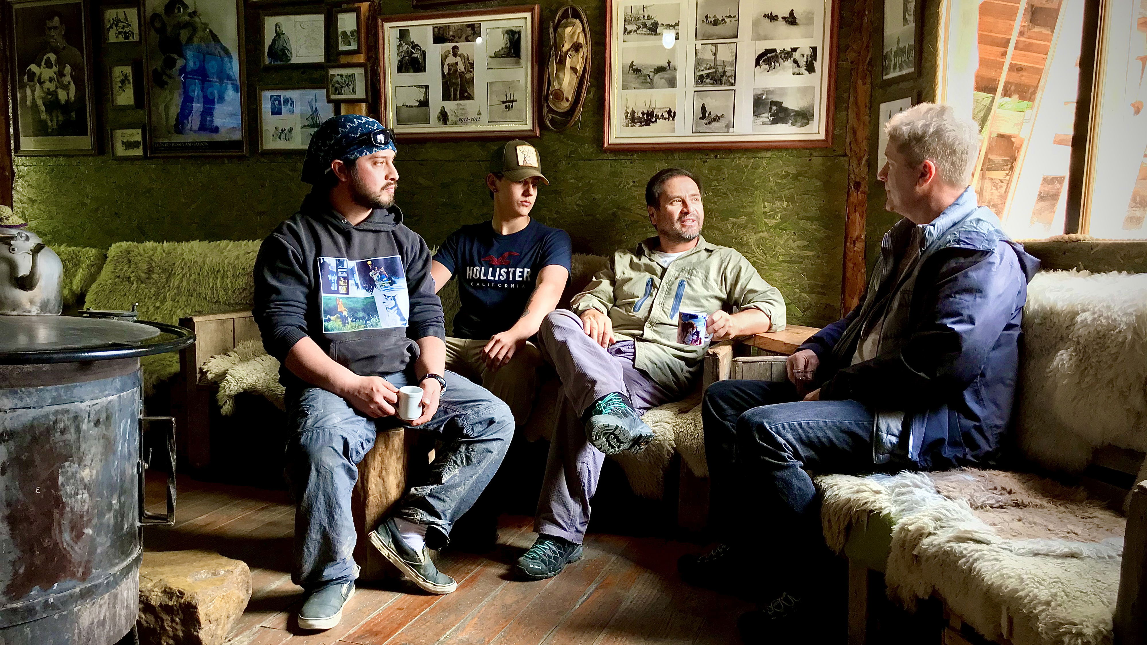 Robert DeLaurentis visits with a family in Siberianos de Fuego, Argentina, during his polar circumnavigation.