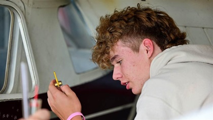 ...and Reid Samson participate in a preflight.