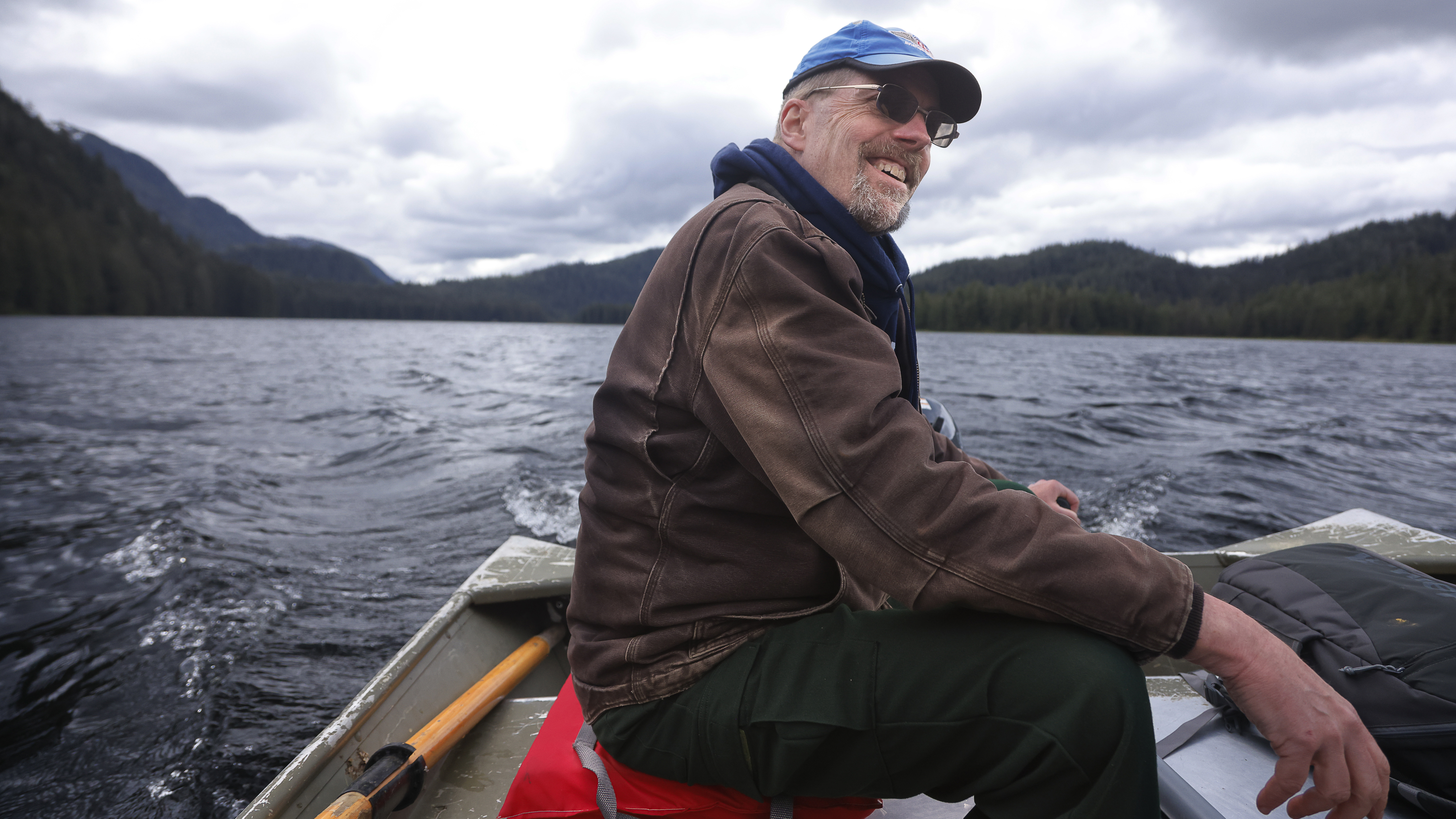Jeff DeFreest guides a U.S. Forest Servicesupplied boat across Heckman Lake.