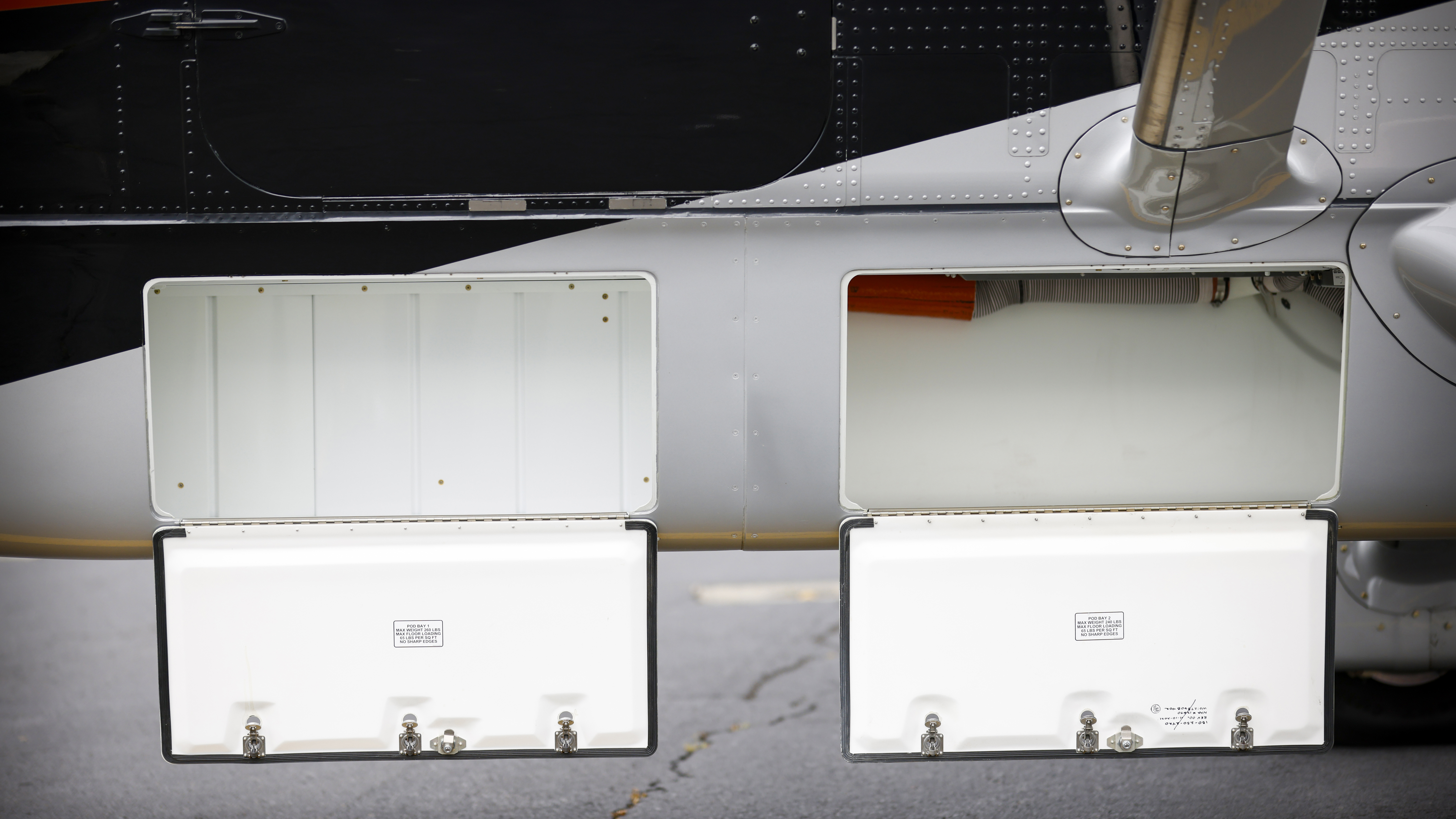 The cargo pod, now integral to the airframe, includes easy access to the TKS fluid tank behind the false wall in the forward compartment.