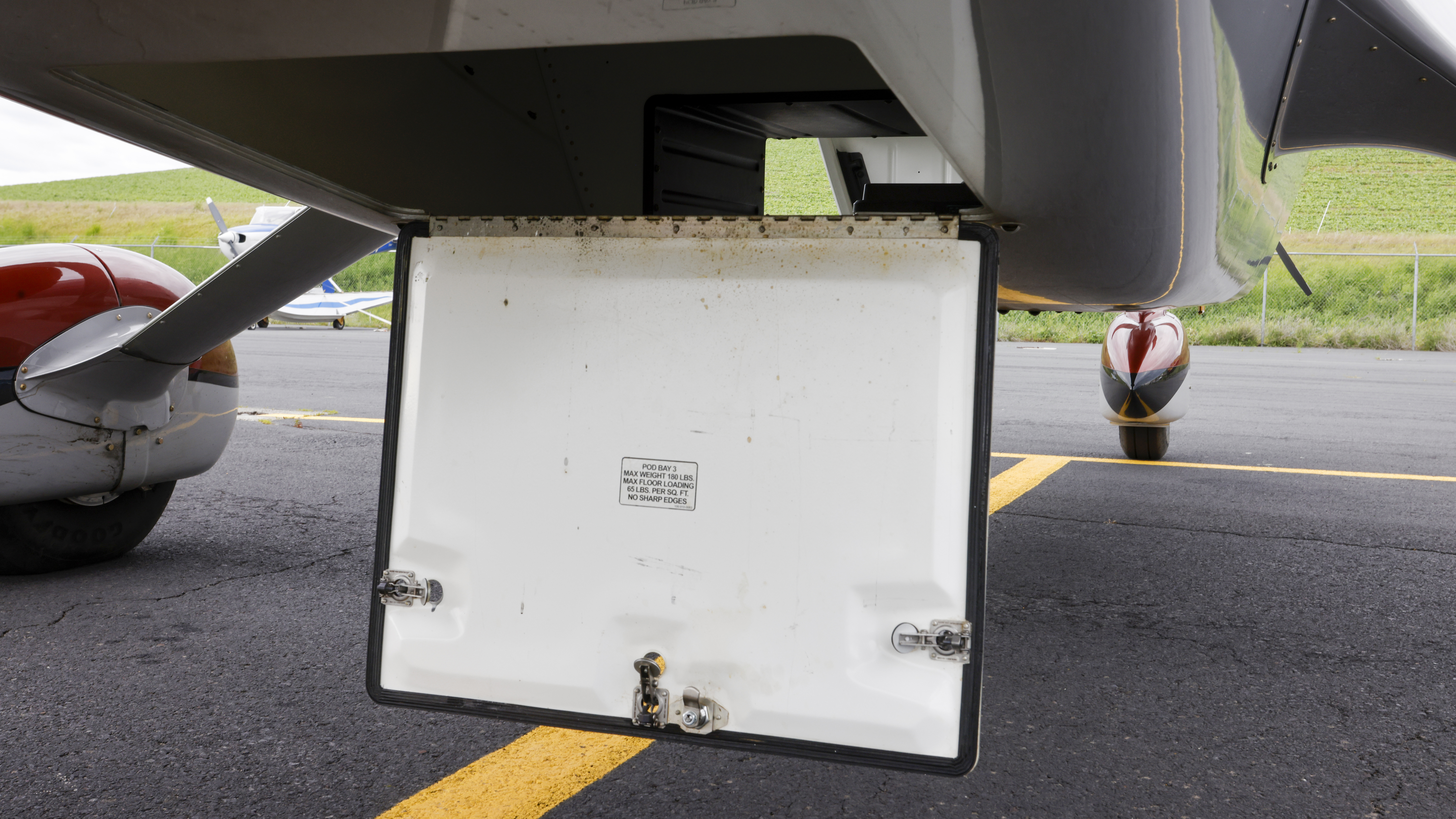 A new aft hatch on the bottom of the cargo pod allows for the loading of long items into the back two compartments.
