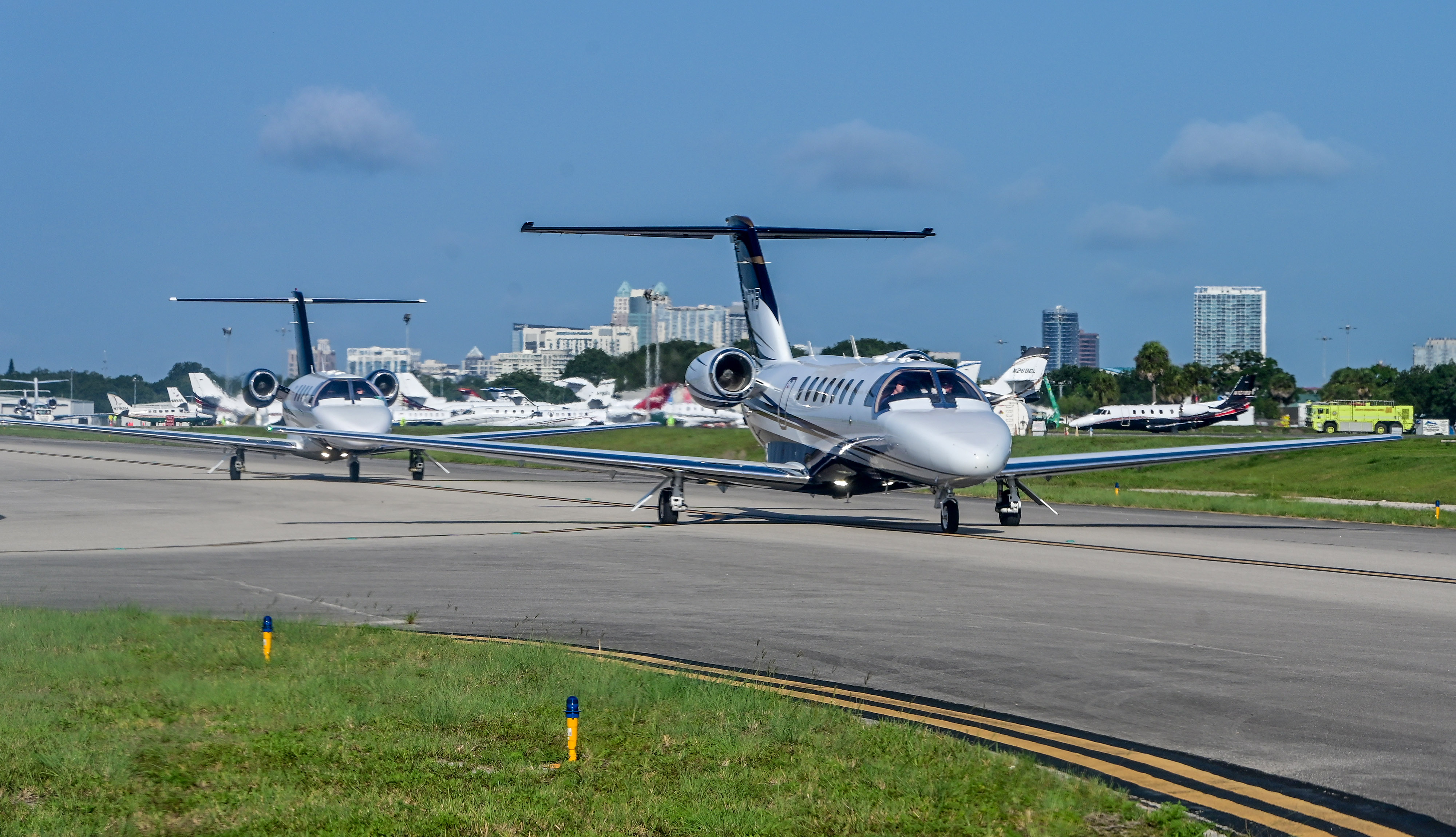 It’s a conga line of jets departing Orlando Executive Airport, bound for locations across the country.