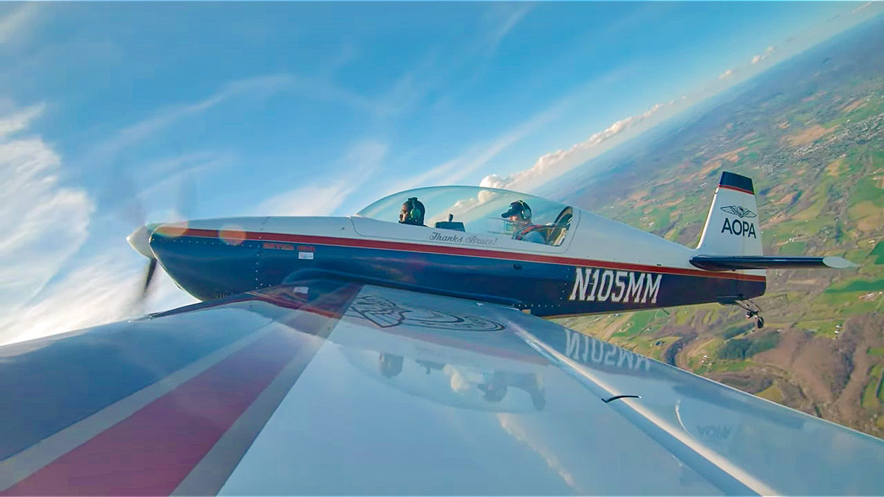 Flying the Extra is strenuous but also fun and exhilarating.