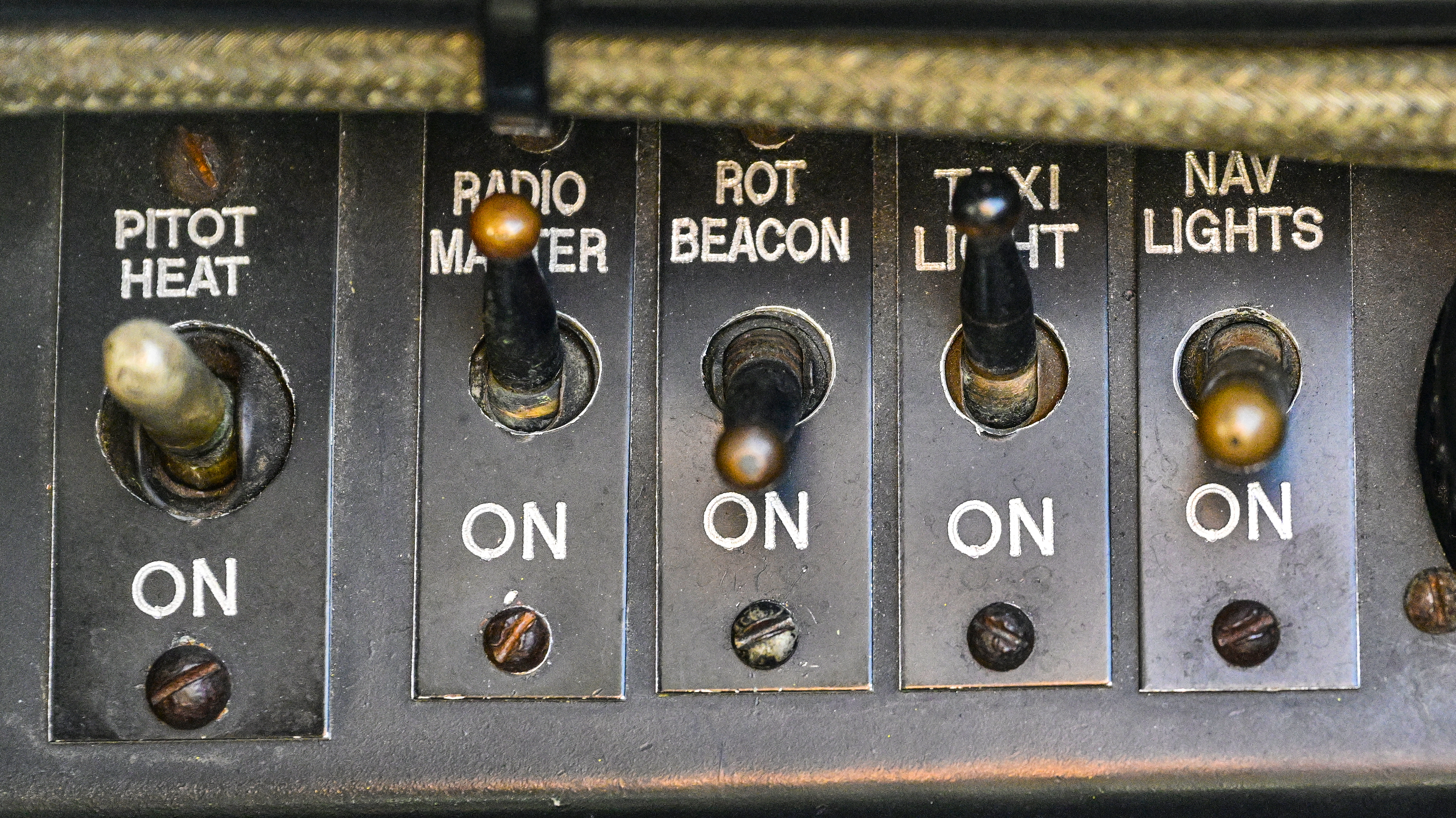 A spartan switch panel is at the pilot’s left elbow in a 1953 DHC-1 de Havilland Chipmunk owned by David Bundock at Andover Airport in New Jersey, October 18, 2022. Photo by David Tulis.