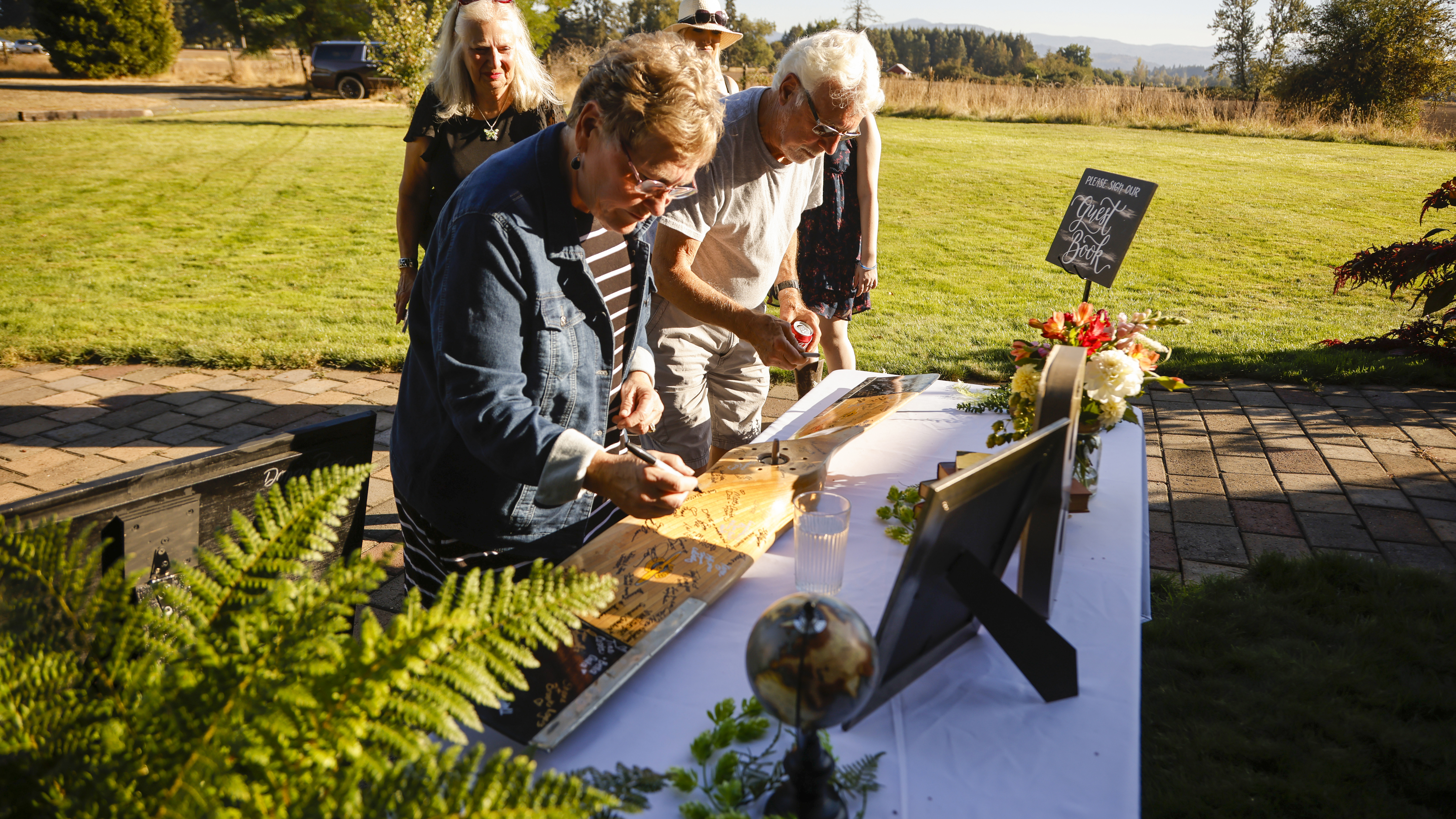 Guests signed a wooden propeller.