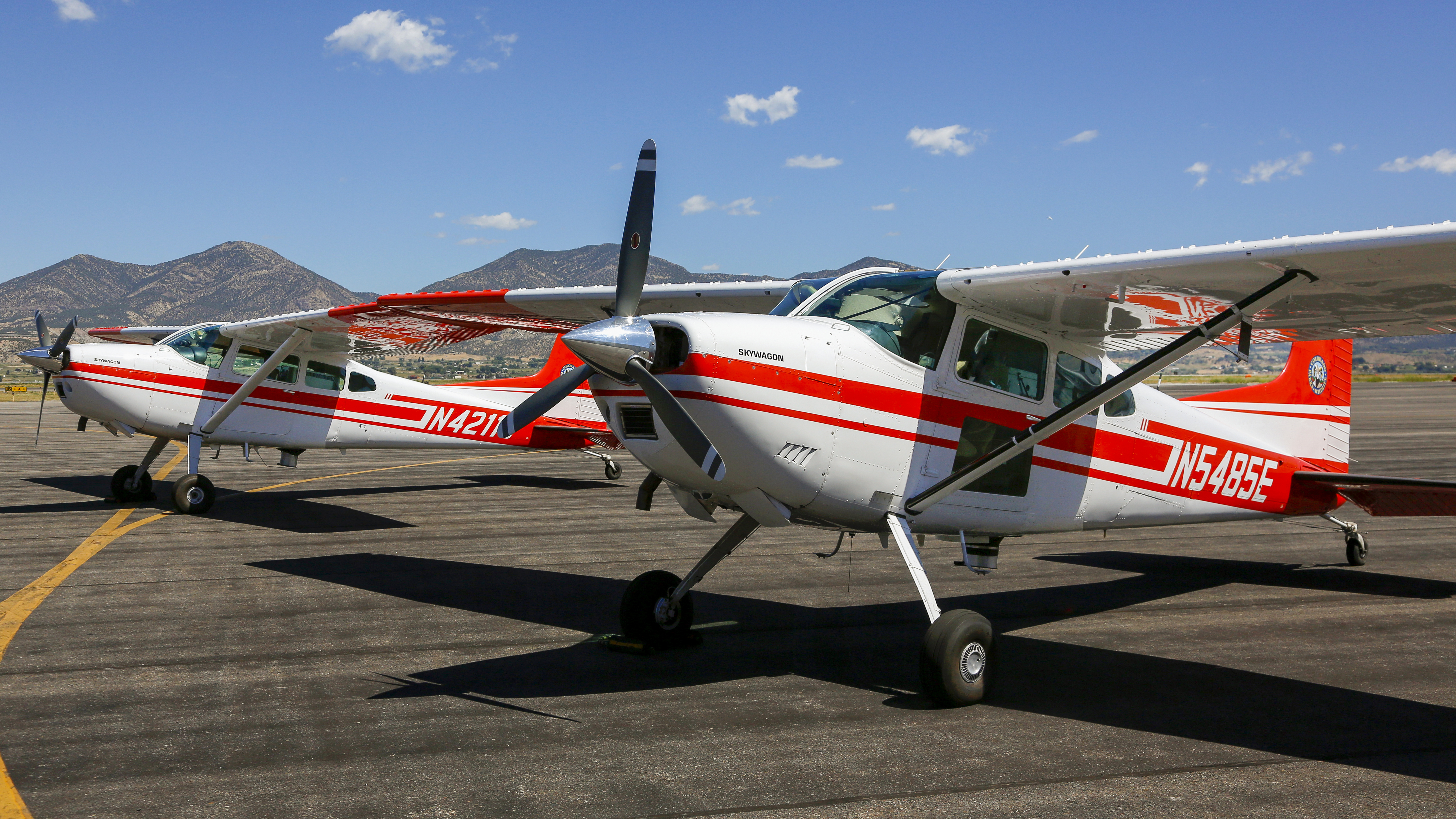 Half the Skywagon fleet at Rifle, Colorado, awaiting their little squirmy passengers.