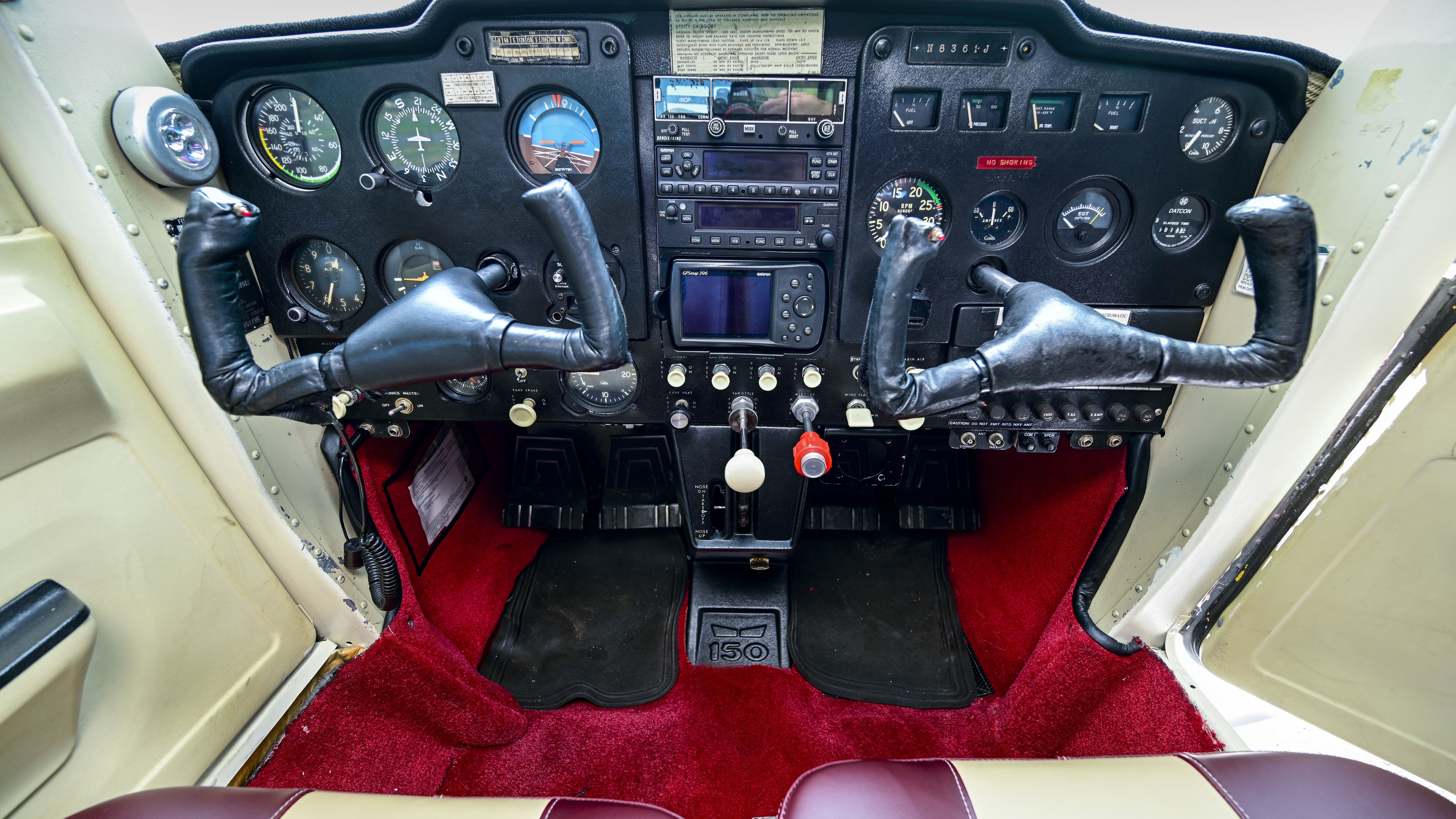 A Garmin center stack with a GTR 225 communication radio, GTX 327 digital transponder, and GPSMAP 396 in an Air Gizmo mount modernize the 1967 Cessna. The BendixKing KX 125 GPS/com enhances VFR situational awareness.